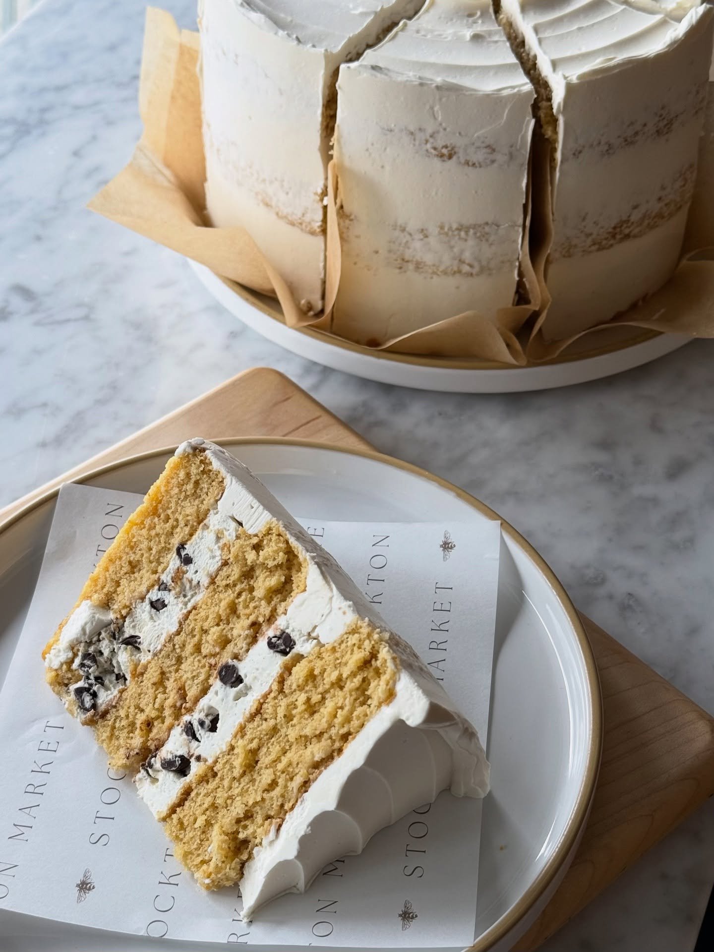Now readily available in the case on weekends &mdash; our gluten‑free cake slices are a delicious option for guests seeking gluten‑free treats 🤍

Each slice features tender vanilla cake layered with a light buttercream frosting and a creamy filling,