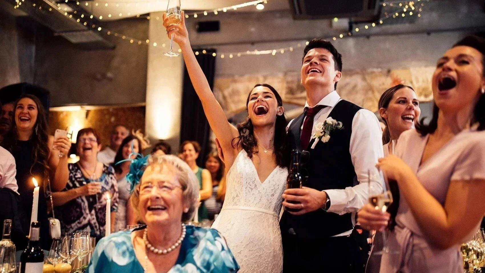Groom and Bride celebrating their wedding in Humble Grape