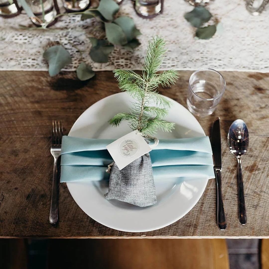 Little Saps gift tree wedding favors at a place setting