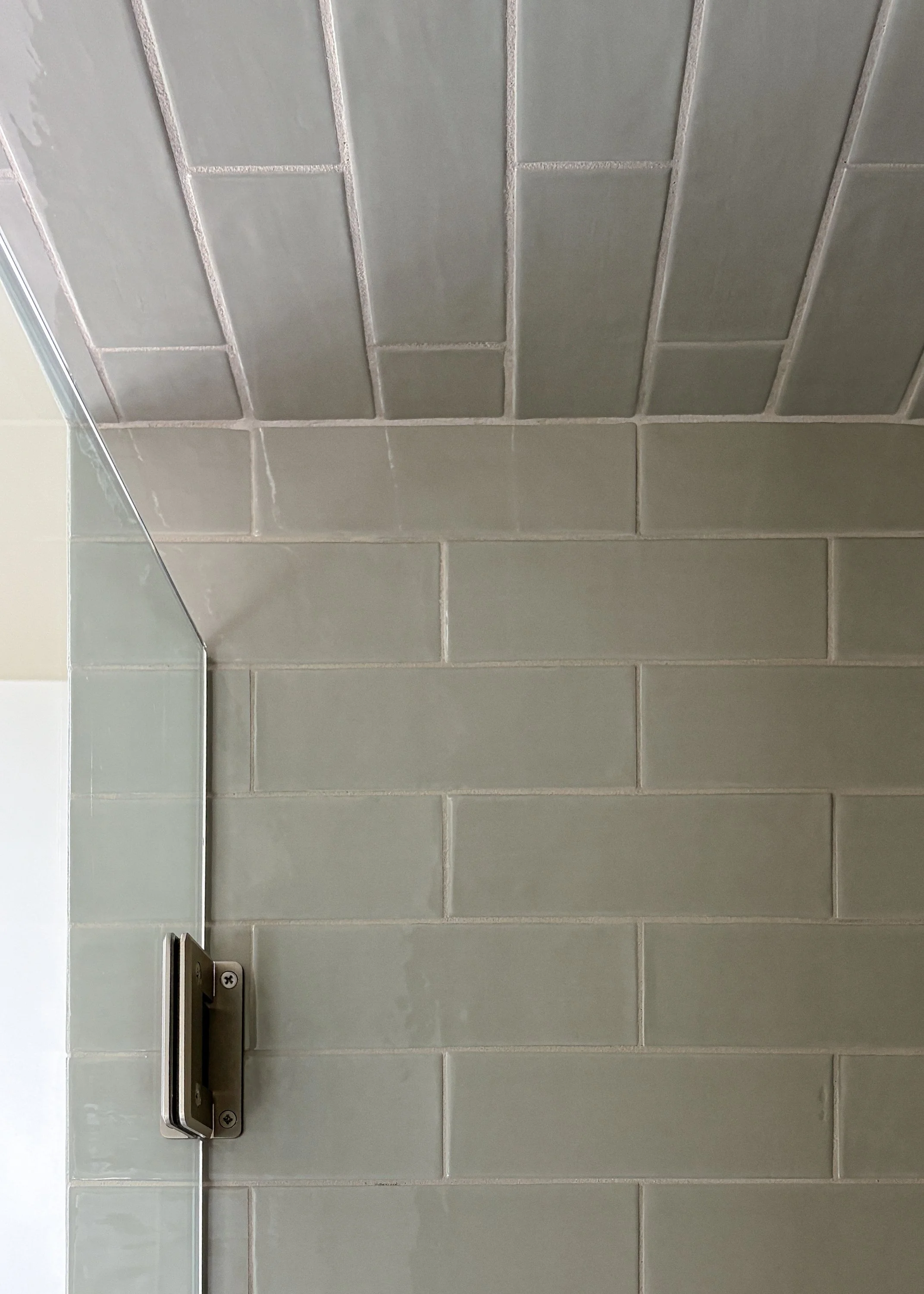 Walk in tile shower. Glass frameless door. Bathroom addition remodel. 