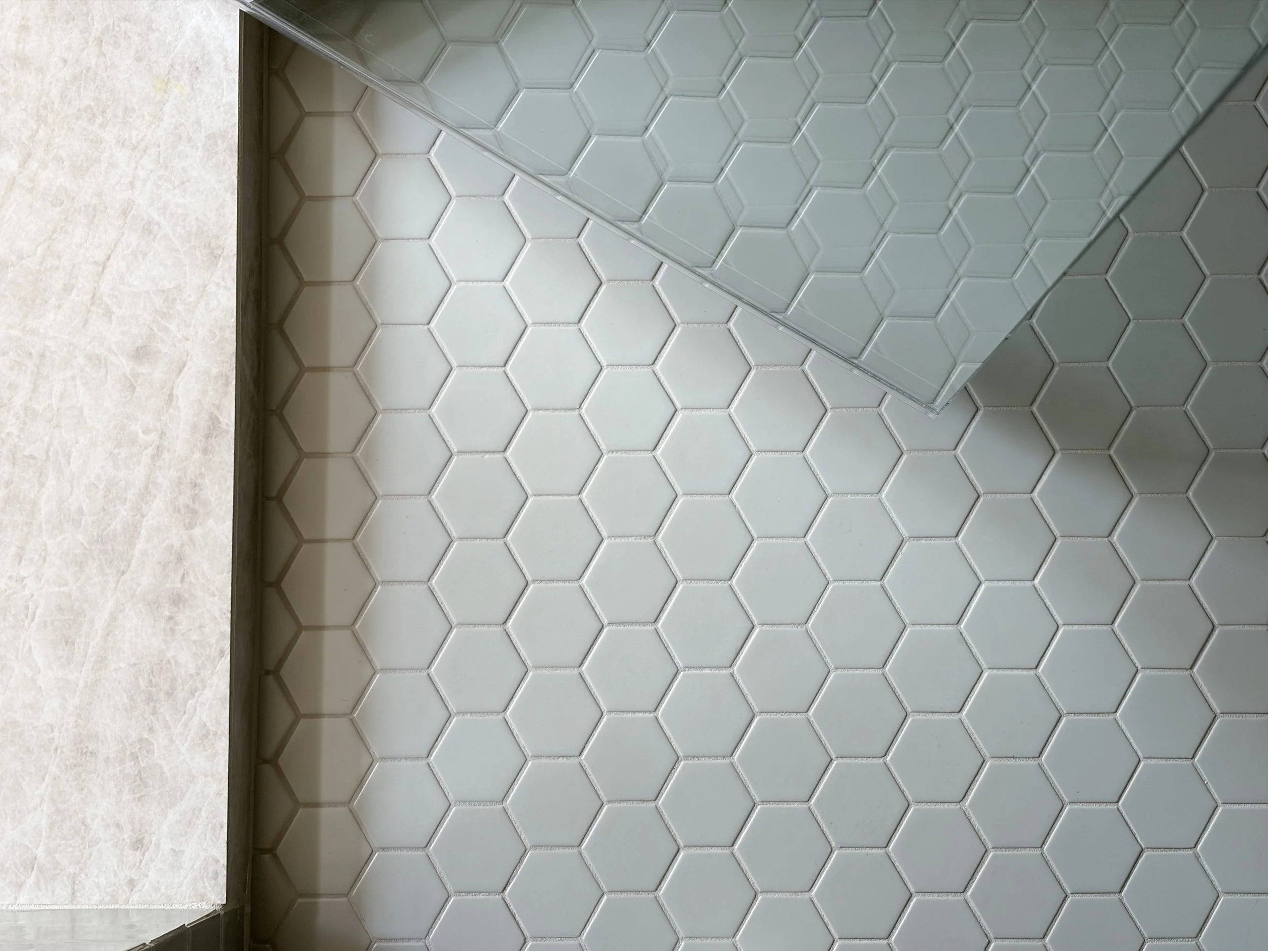 Walk in tile shower. Glass frameless door. Bathroom addition remodel. 
