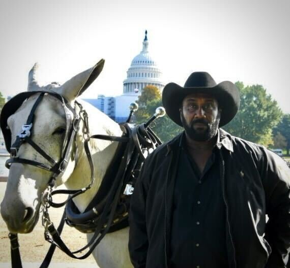  John Boyd Jr., president of the National Black Farmers Association, and his mule Jesus. Credit: John Boyd, Jr. 