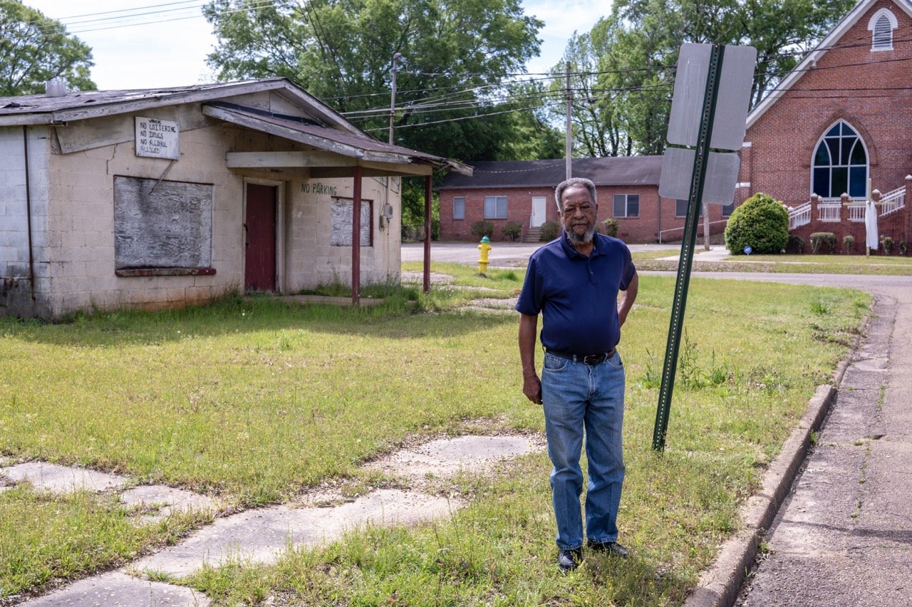  Bill Smith stands on Jones Street in Ruston, Louisiana, in front of the building that was Averne Smith's cafe. Credit: Ben Greenberg 