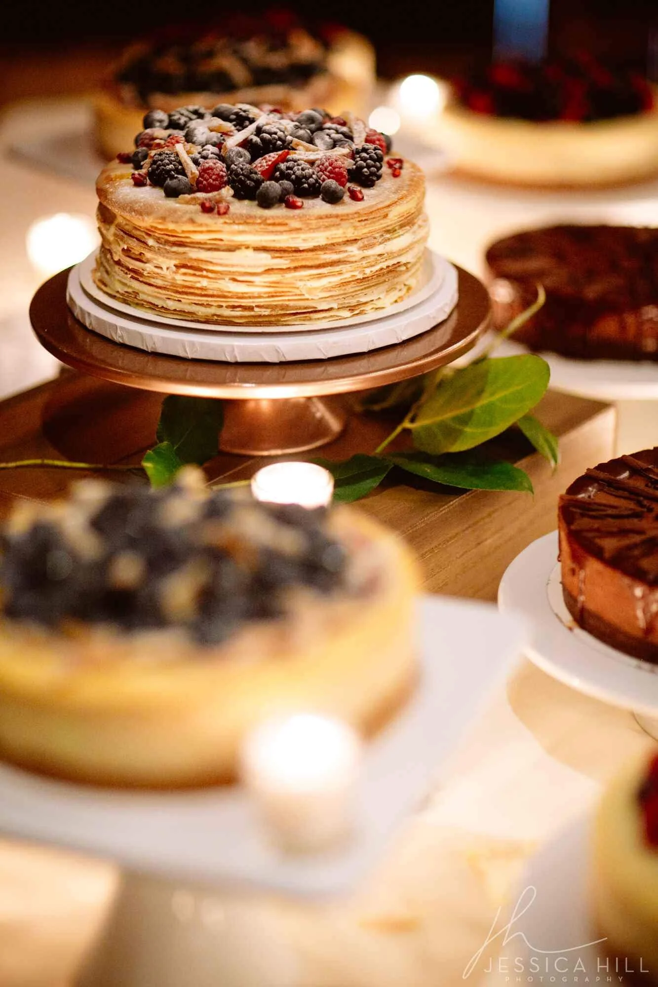 cheesecake-dessert-table-cutting-crepe-cake-.jpg