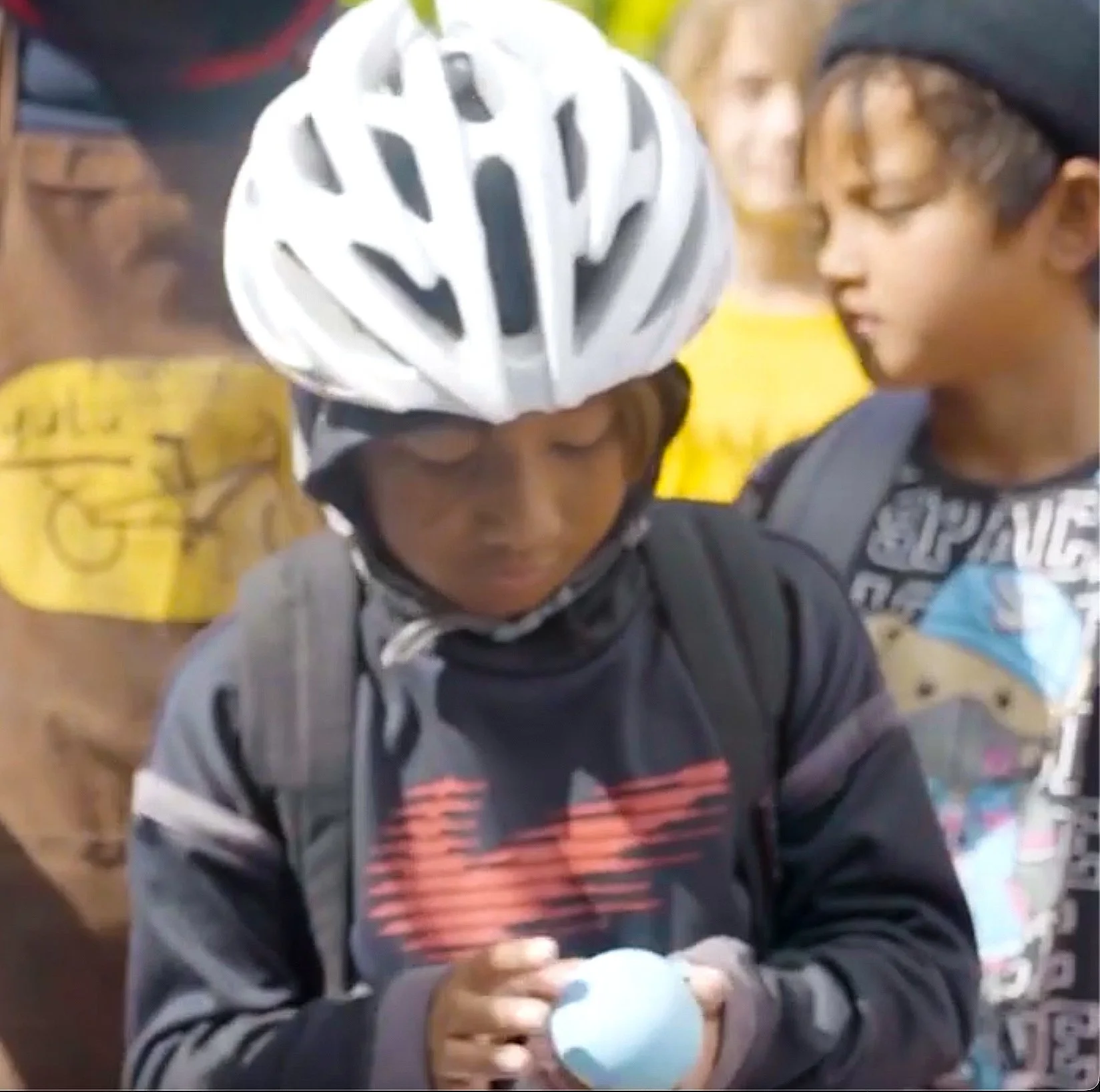Over 80 kids came to the balloon throw, and 8 told their personal stories that inspired the mural.