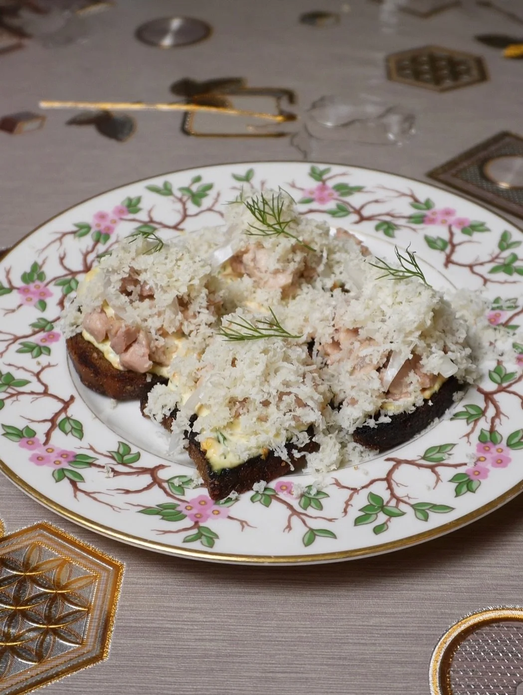 One of the OGs - COLD LIVER BUTERBROD! We like to call it the foie gras of the sea. Served on borodinsky toast with carrot &amp; druzhba cheese pashtet, pickled onions, and freshly shaved horseradish. A savory bite with juuust the right amount of kic