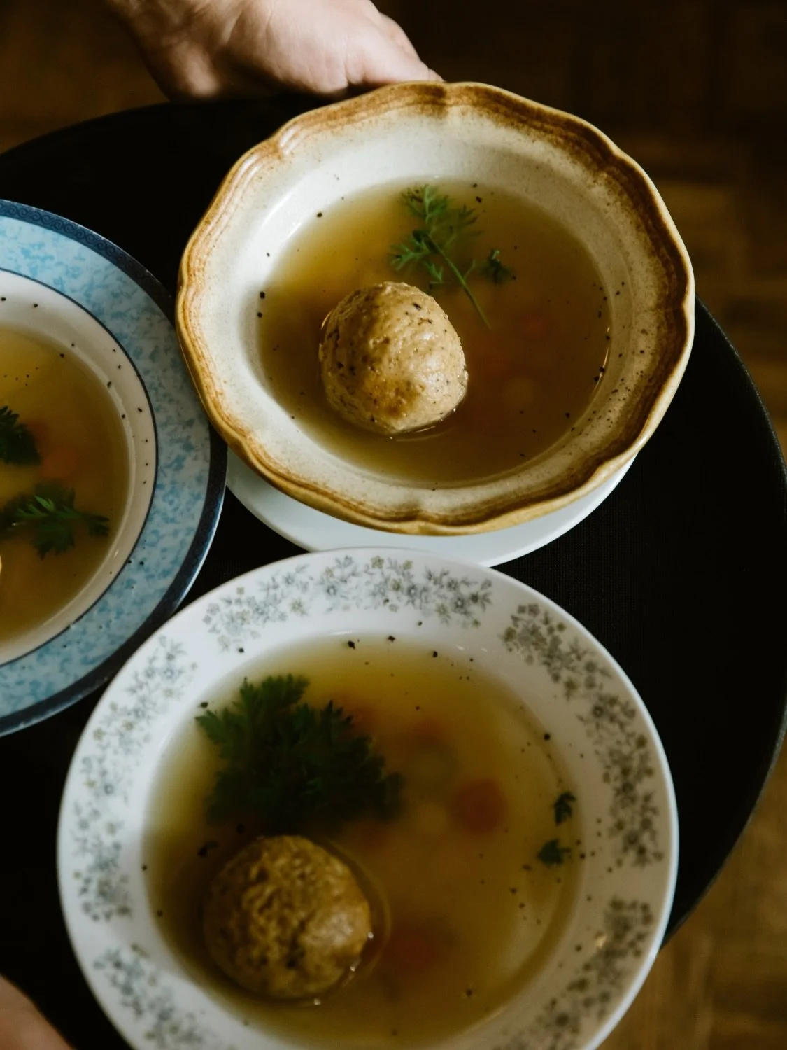Passover begins tomorrow and we are serving up the coziest of cozy bowls of matzo starting TONIGHT! Savory, rich, delicious chicken broth with matzo, carrots, and parsley. Available at lunch and dinner time through April 7th!

And FYI - we will be CL