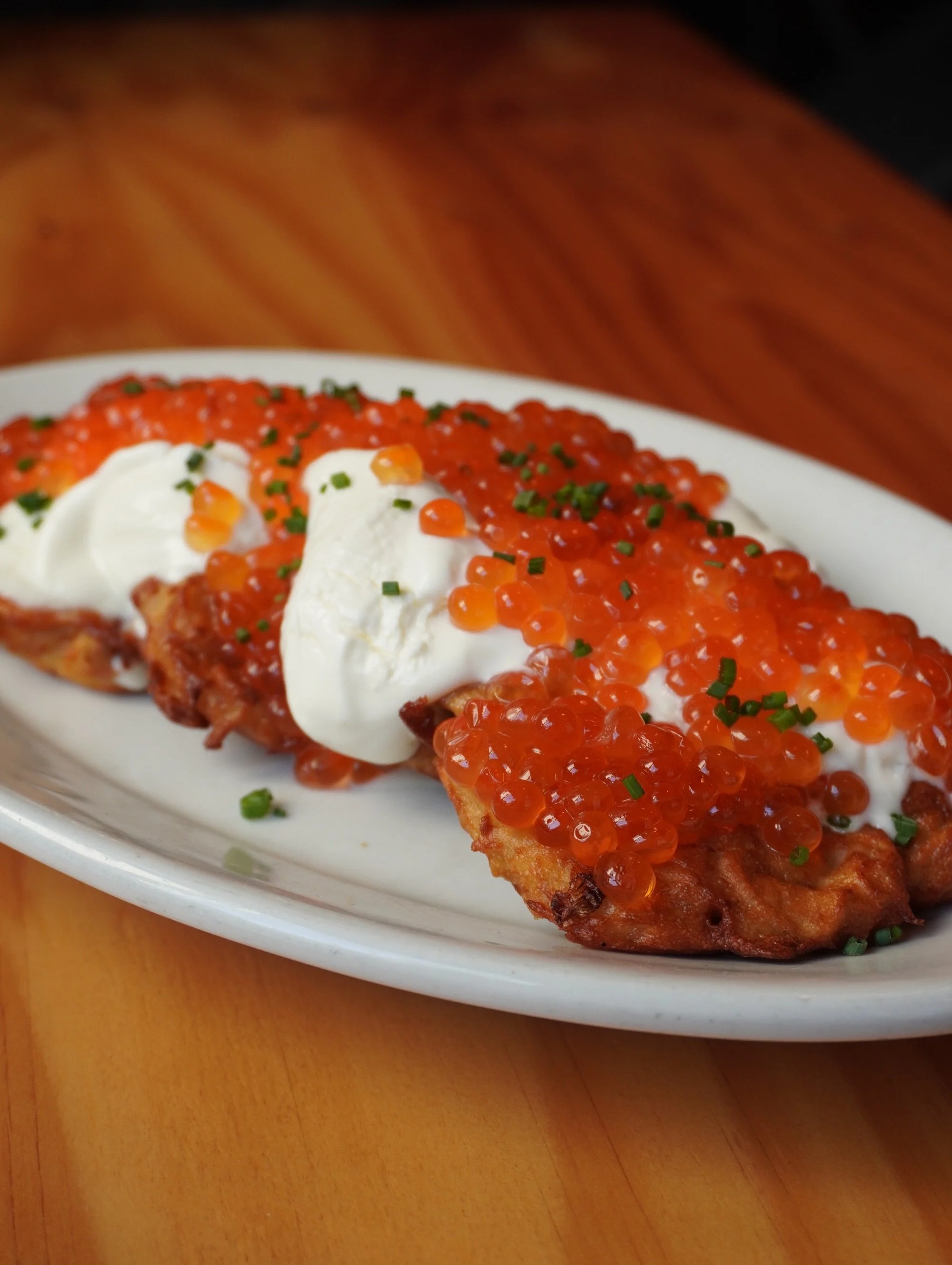 FOR A LIMITED TIME! This super special special comes around but once a year, and it&rsquo;s here - our house cured ✨ CHINOOK SALMON ROE✨ Served over crispy draniki dolloped with smetana. If you know, you know- blink and it&rsquo;s gone. If you&rsquo;