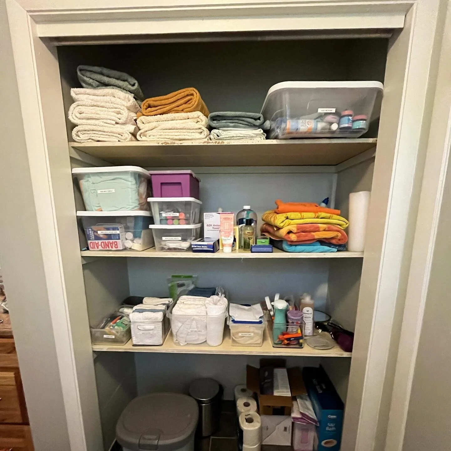 Maximize space by utilizing storage bins and shelves to keep toiletries, towels, and medicine neatly arranged.  Utilize drawer dividers and labeled containers to separate and categorize items for easy access.  #BathroomOrganization #MaximizeSpace #ho
