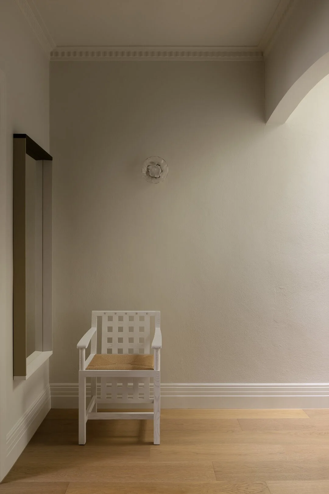 Heritage interior hallway of Silver House featuring original cornices, arched doorway, and curated furniture by By Mysa.