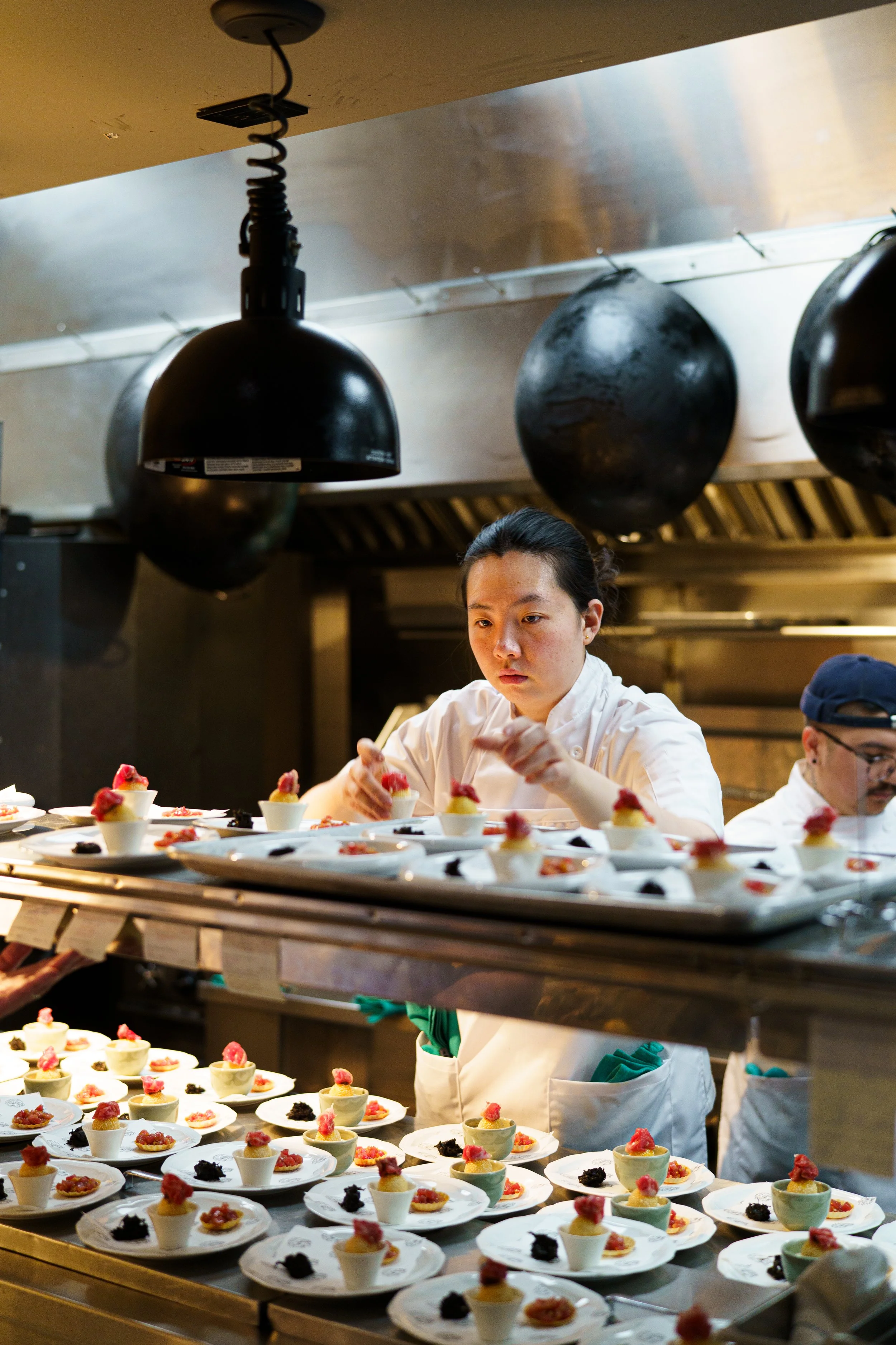 The view of inside a restaurant kitchen from the outside.