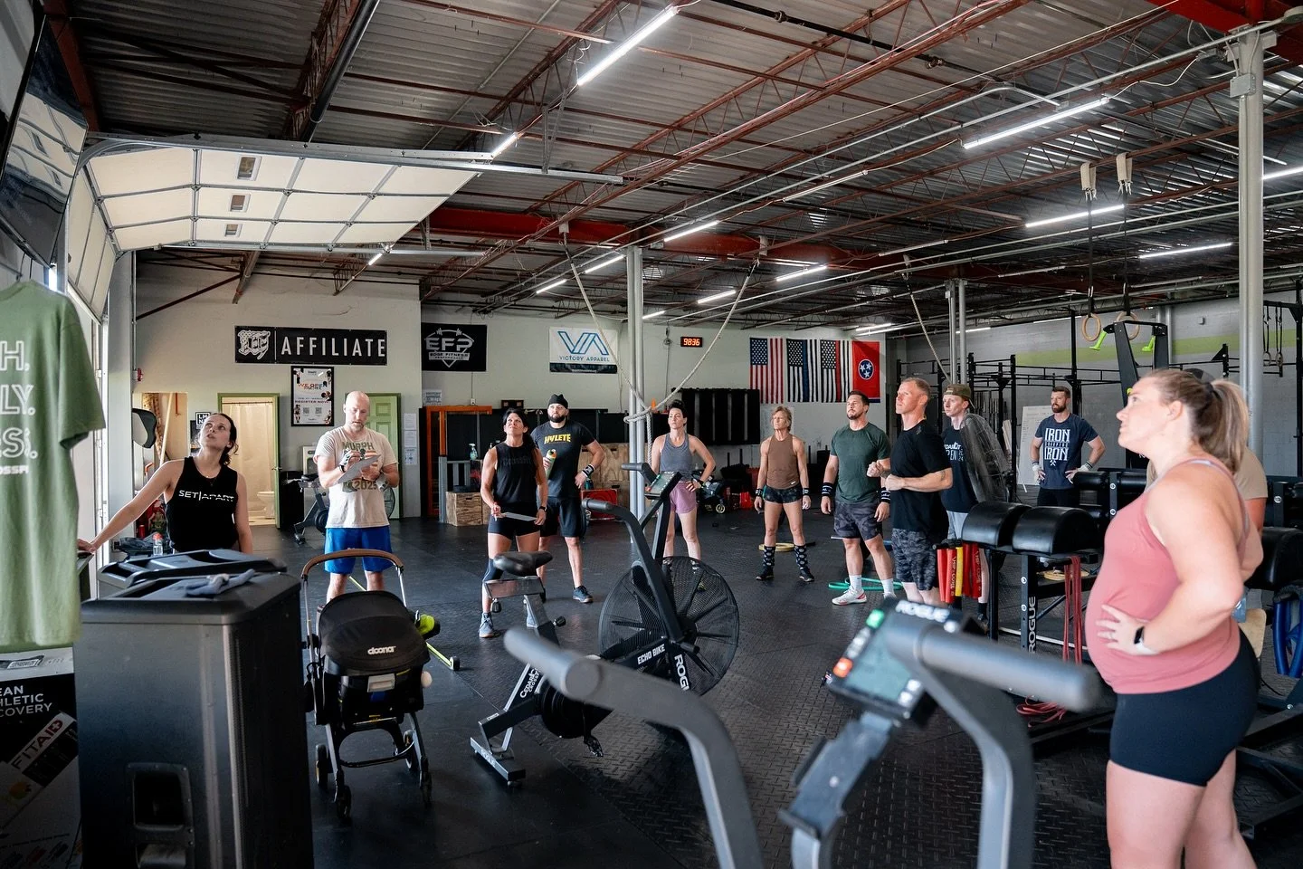 The Whiteboard Debrief. This is where the coach will go over the workout, modifications, standards, and stimulus of the workout. This is importance so that each athlete understands the goal of the workout and does the appropriate modification to fit 