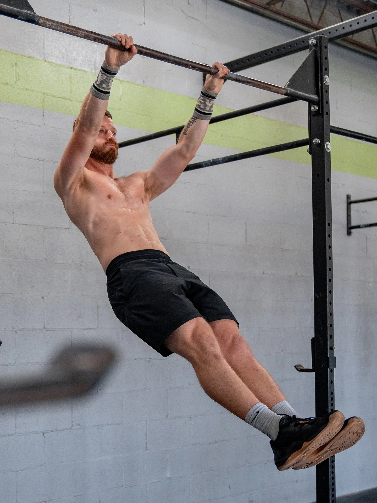 The Kip Swing is a fundamental movement in CrossFit used to create maximum efficiency in movements like the pull-up, chest to bar, muscle up, and toe to bar. 
Two key components of the Kip:
1. Hollow Body (slide 1) - hands and feet are forward while