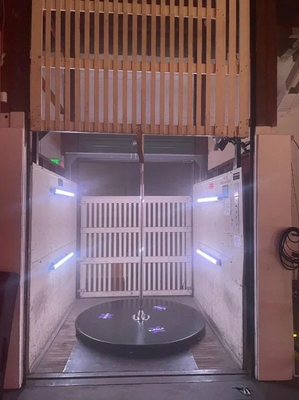 Portable stage pole installed inside an elevator for a private celebrity birthday event, set up by PoleBait rentals in Los Angeles