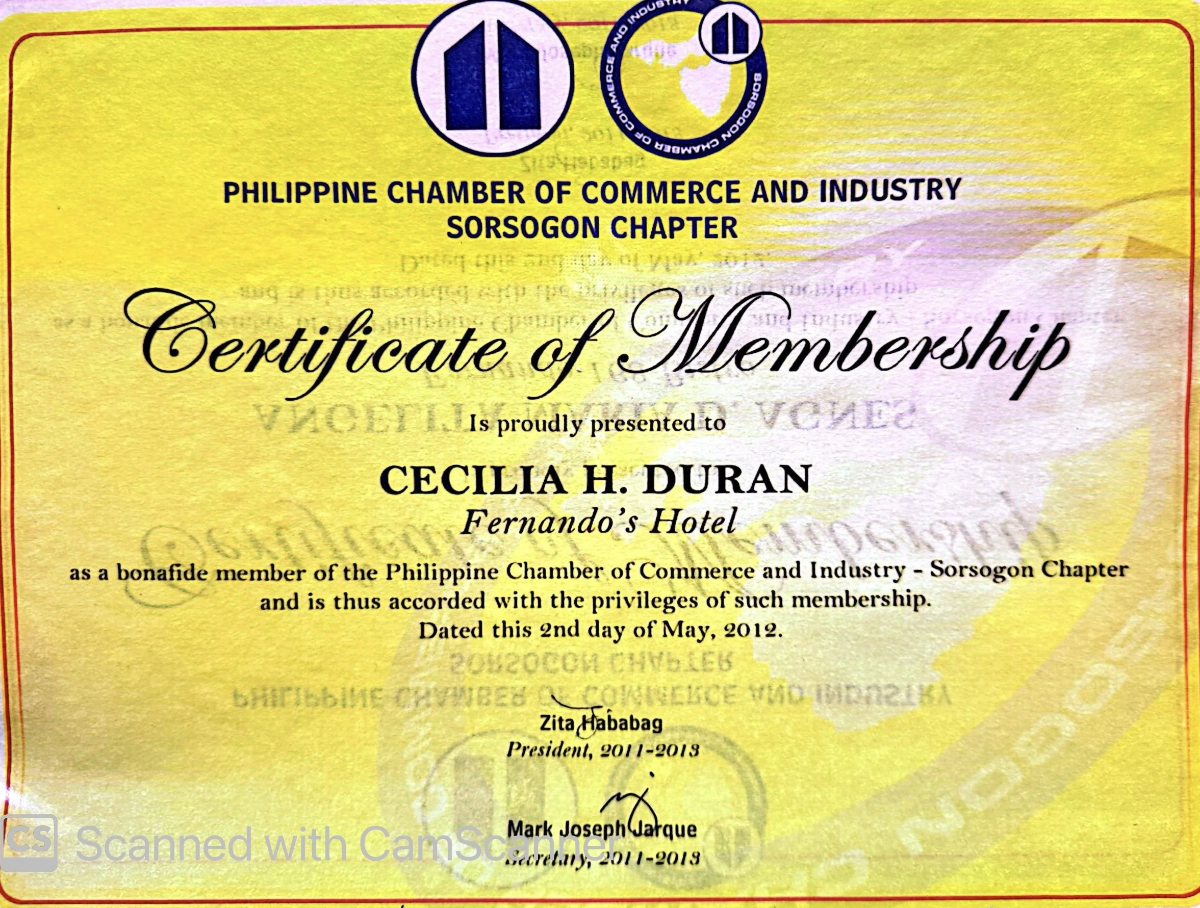 Yellow certificate with red border from the Philippine Chamber of Commerce and Industry, Sorsogon Chapter, awarded to Cecilia H. Duran at Fernando's Hotel for being a bonafide member, dated May 2, 2012, signed by Zita Habadab and Mark Joseph Garque.