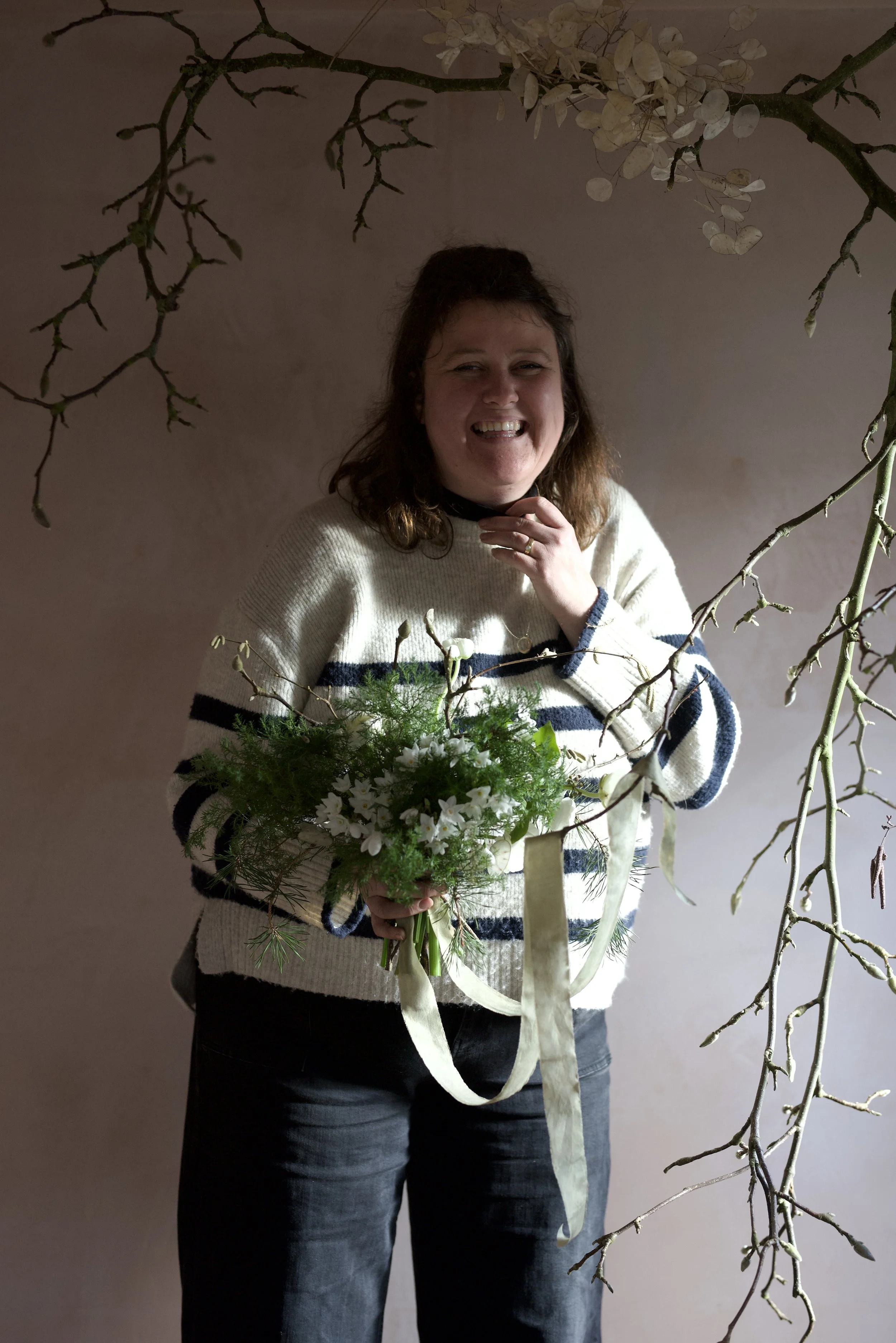 Florist with Seasonal Wedding Bouquet