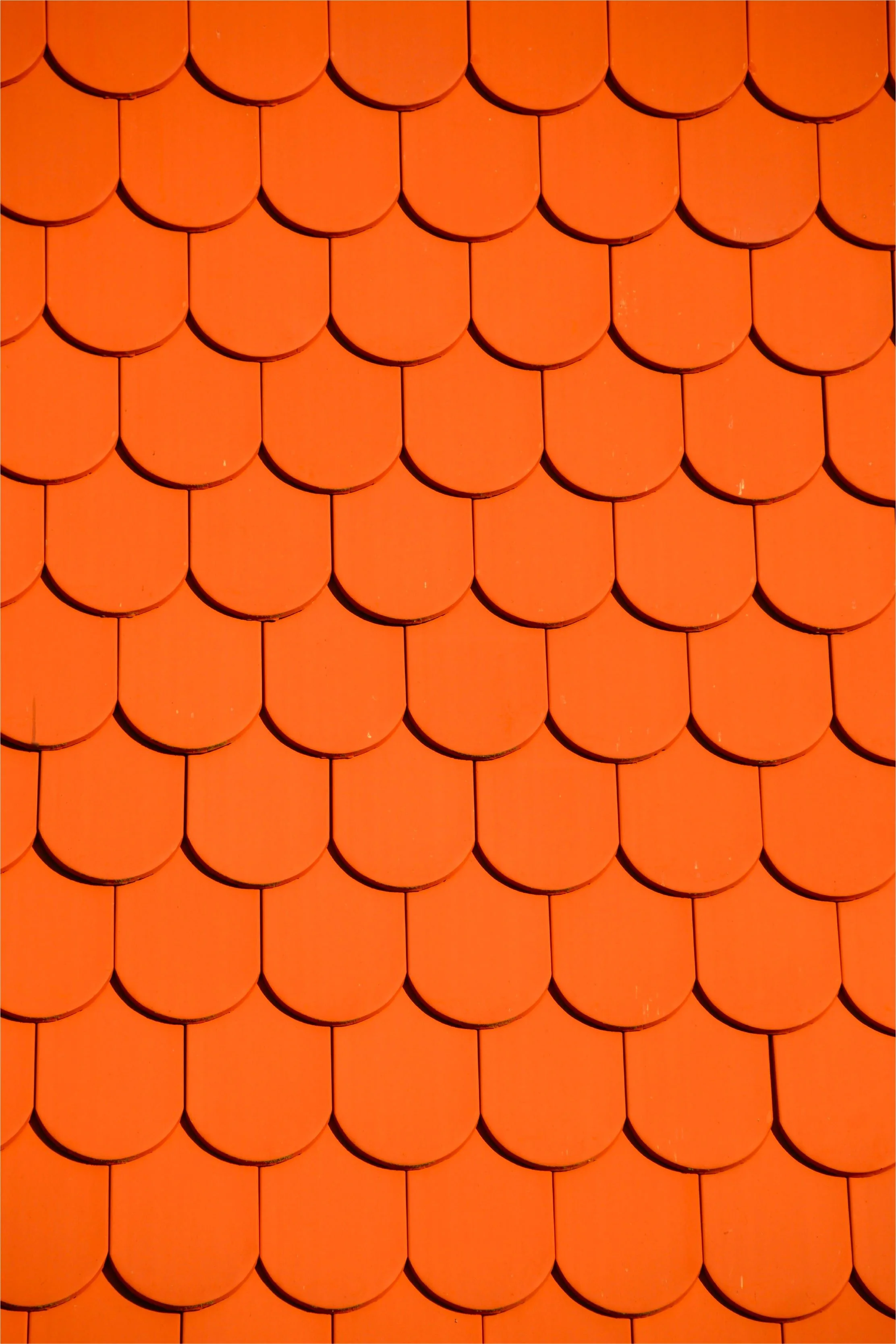 Shingles de toiture de couleur orange.