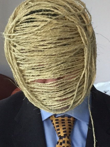   Stuart wrapped (sisal string) , 2019. Sisal string on Stuart with tie and suit.  