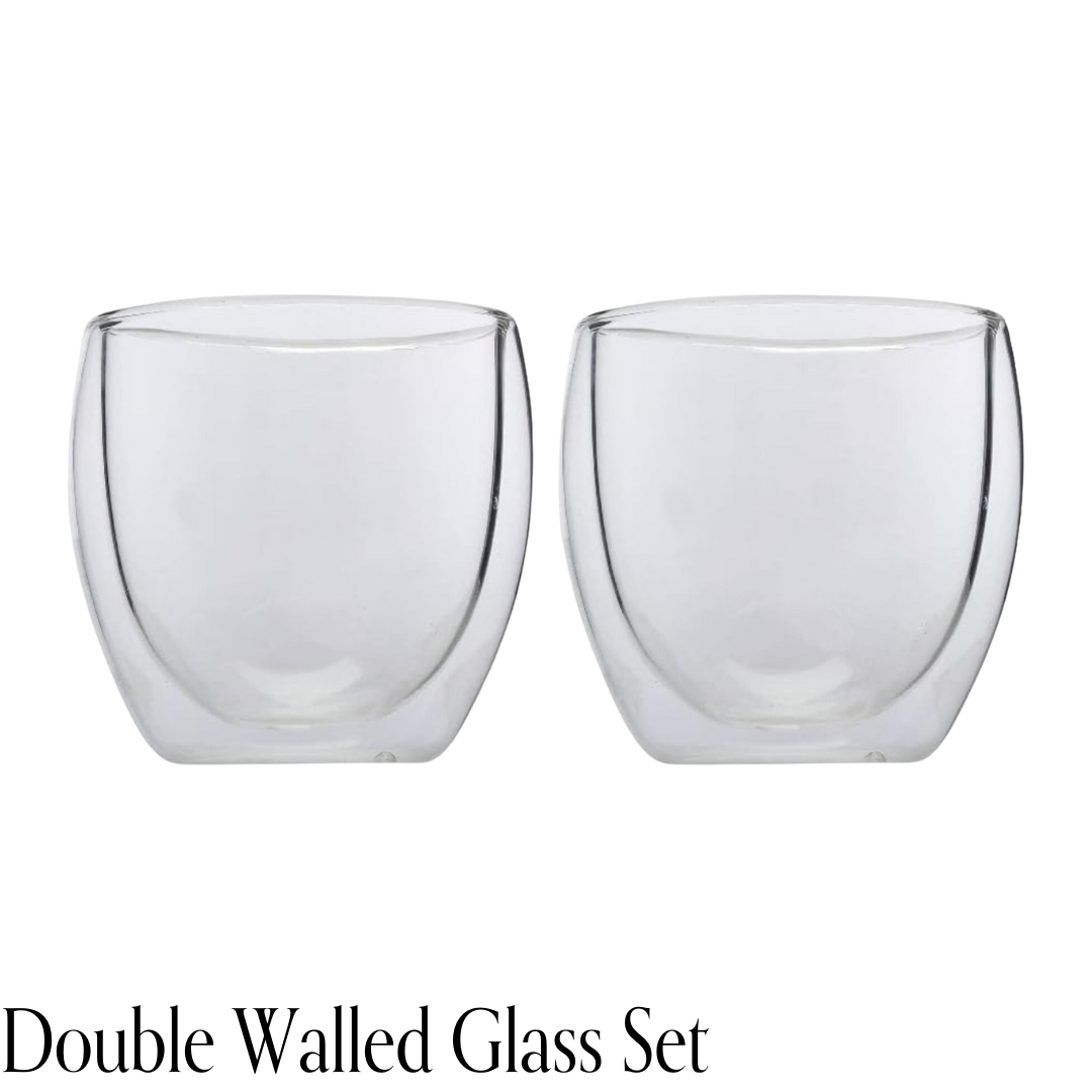Two clear double-walled glass cups side by side on a white background.