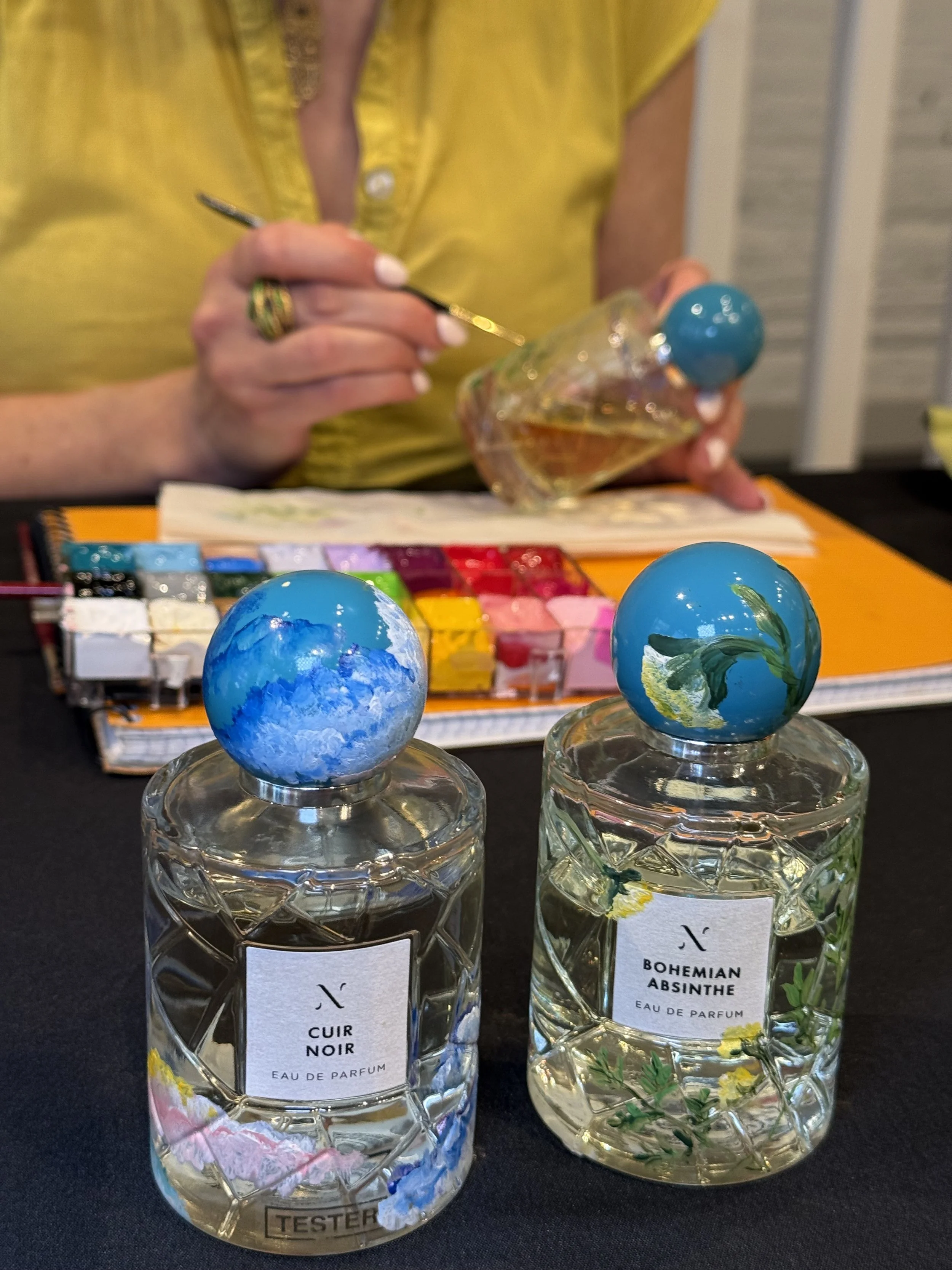 live painting perfume bottles flying solo New York City 