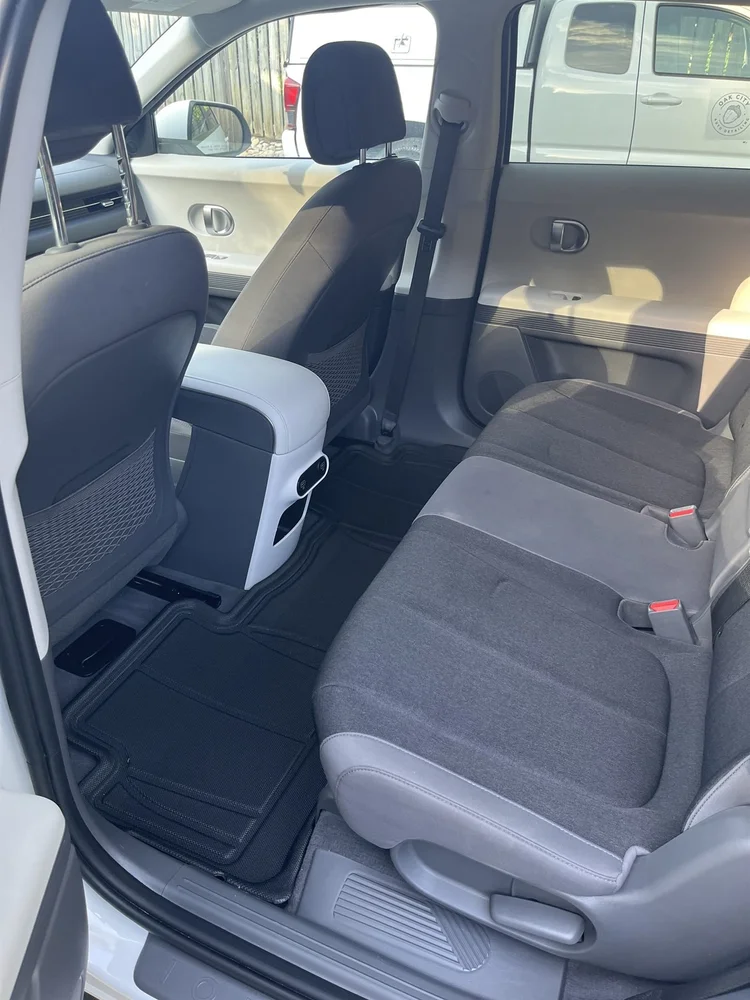 The same back seat spotless after an interior detail