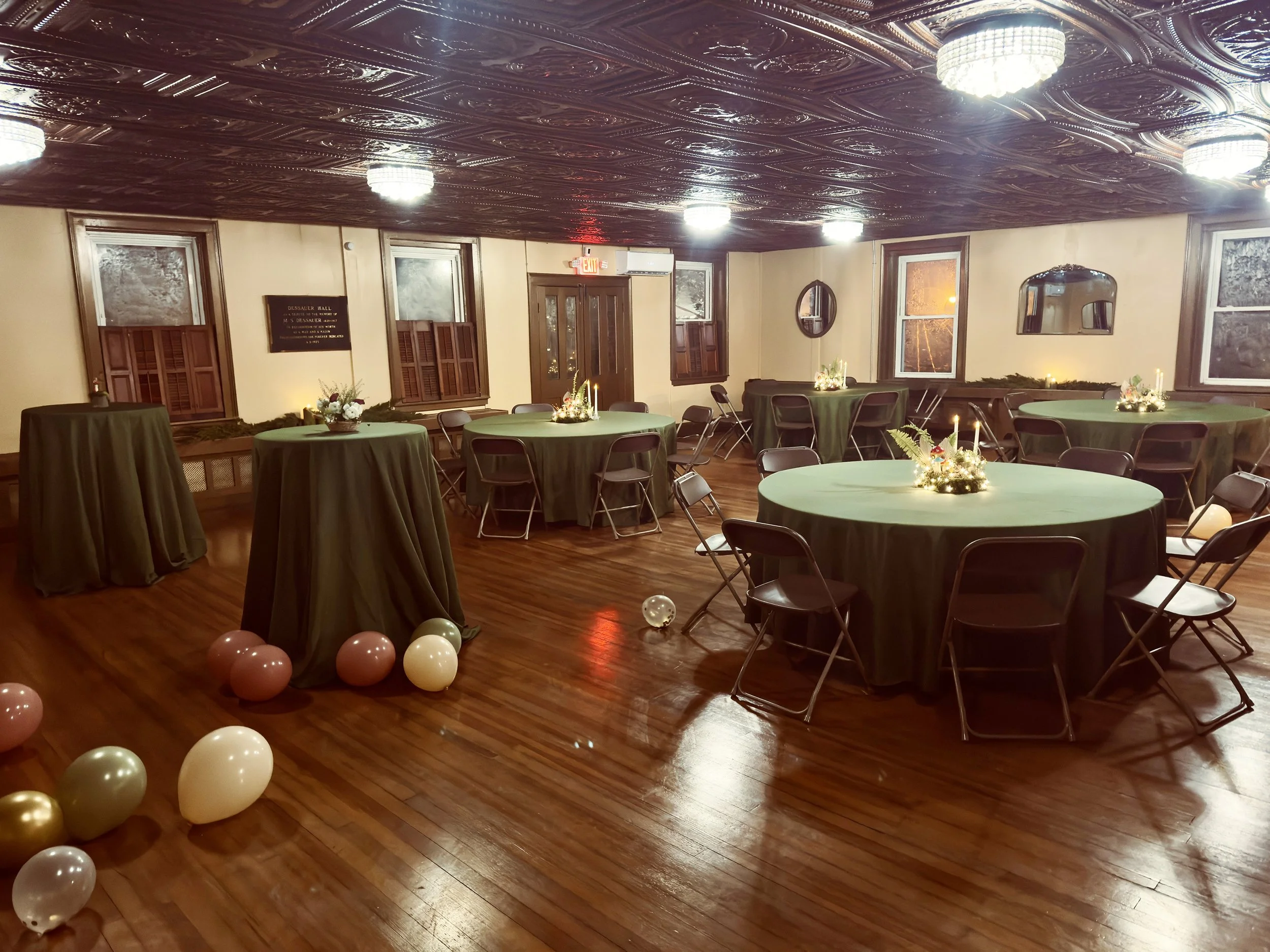 Party in the Banquet Room at The Relic with balloons and beautiful nature inspired centerpieces.