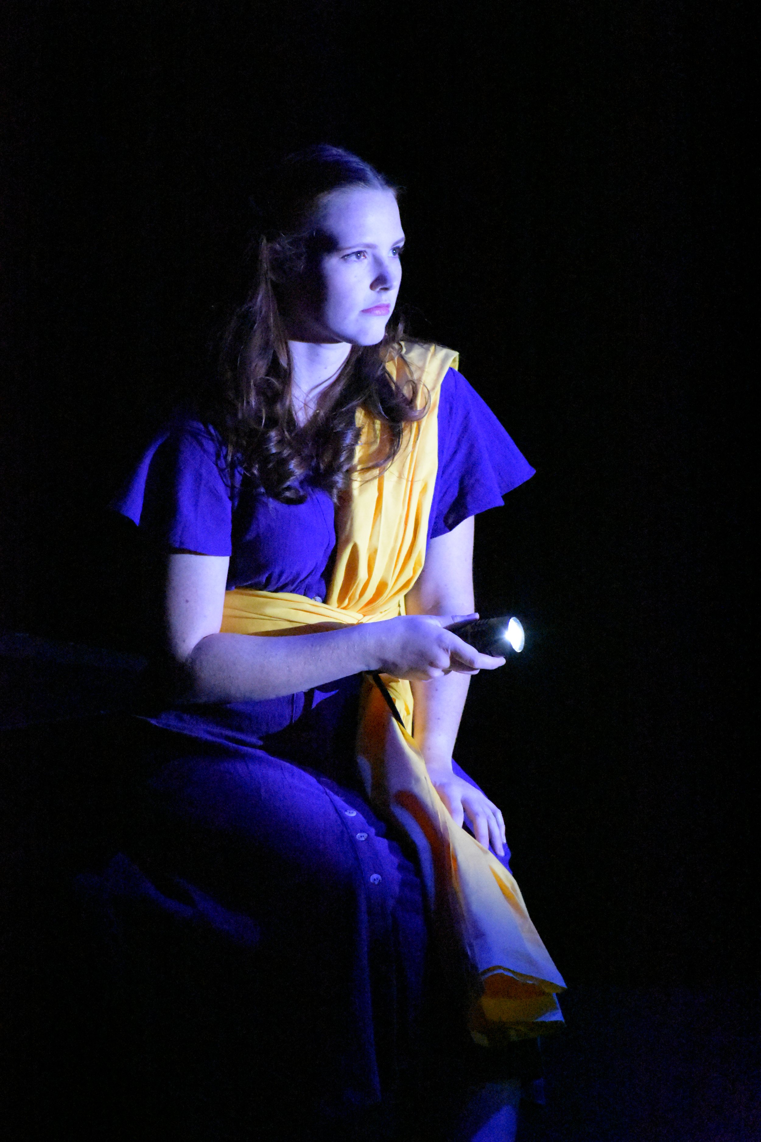 Ismene meets Antigone by flashlight. 
(Photo: Hal Kohlman)