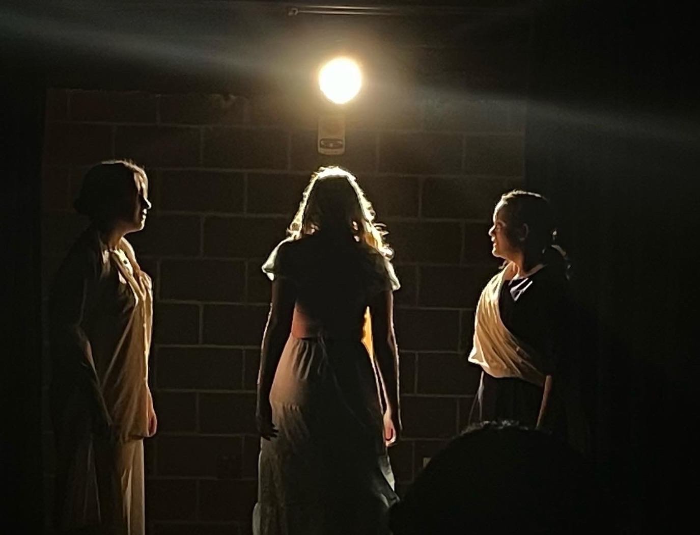 Antigone walks into the cave where she will die. 
(Photo: Ivy Walker)