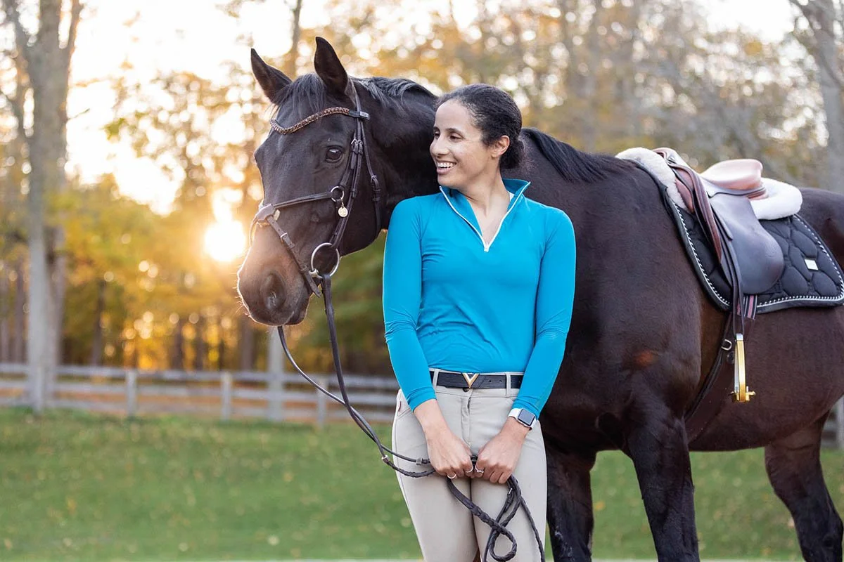Jen Spencer participates in equestrian as part of a movement story.