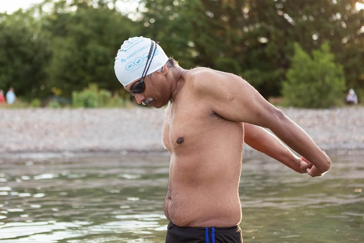 story-madhu-swimmer-lake-stretching.jpg