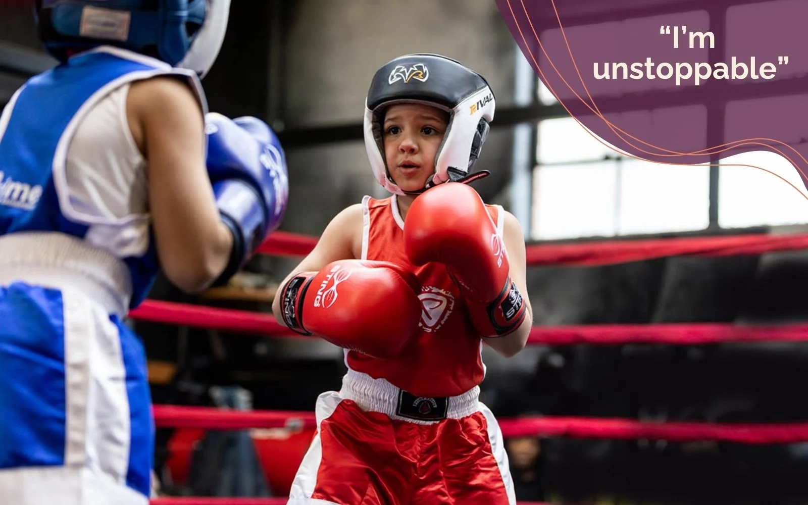 Photo depicting a young girl wearing boxing gloves and helmet in a boxing ring, ready to throw a punch with a quote reading "I'm unstoppable"