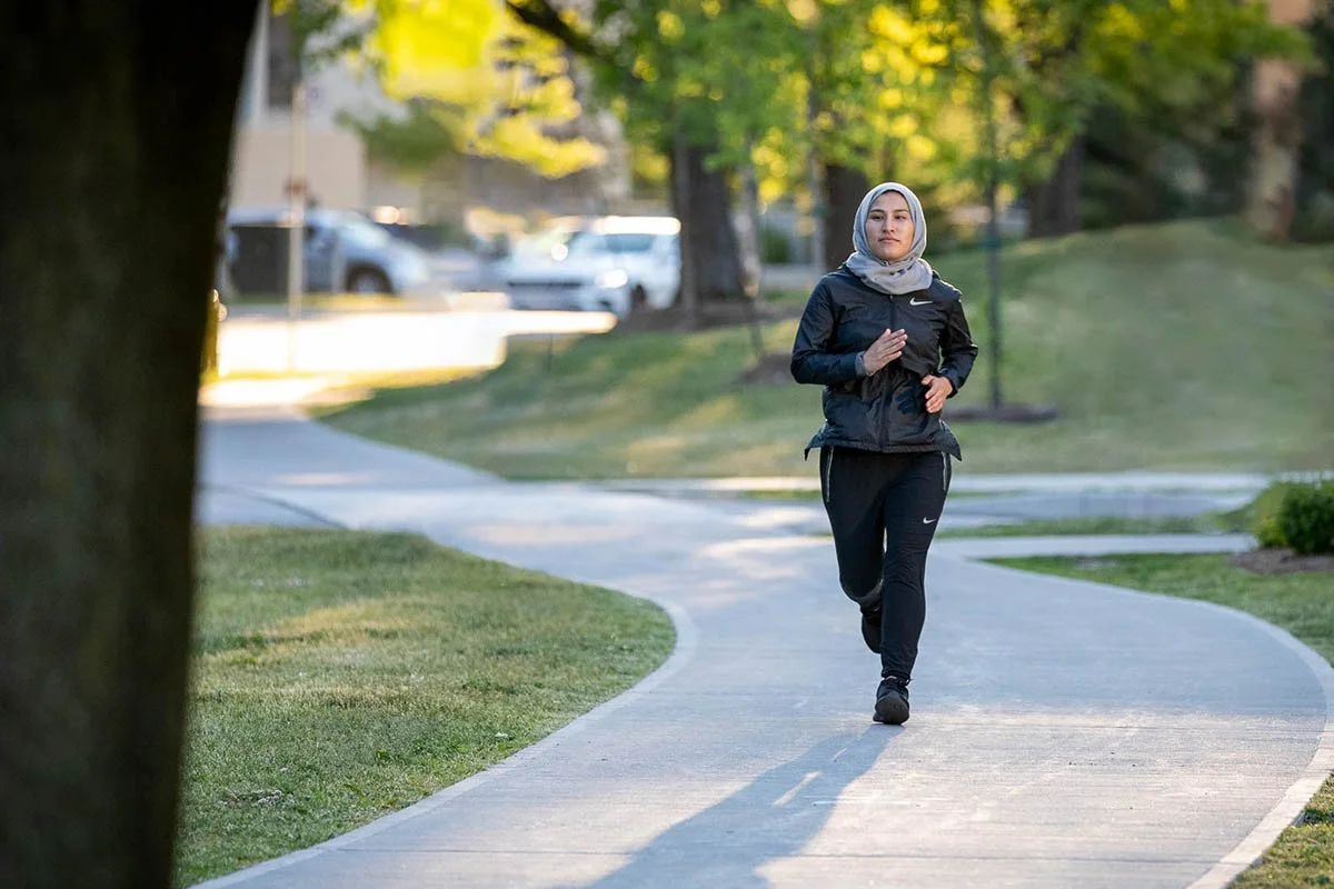 Hakima Hoseini participates in running as part of a movement story.