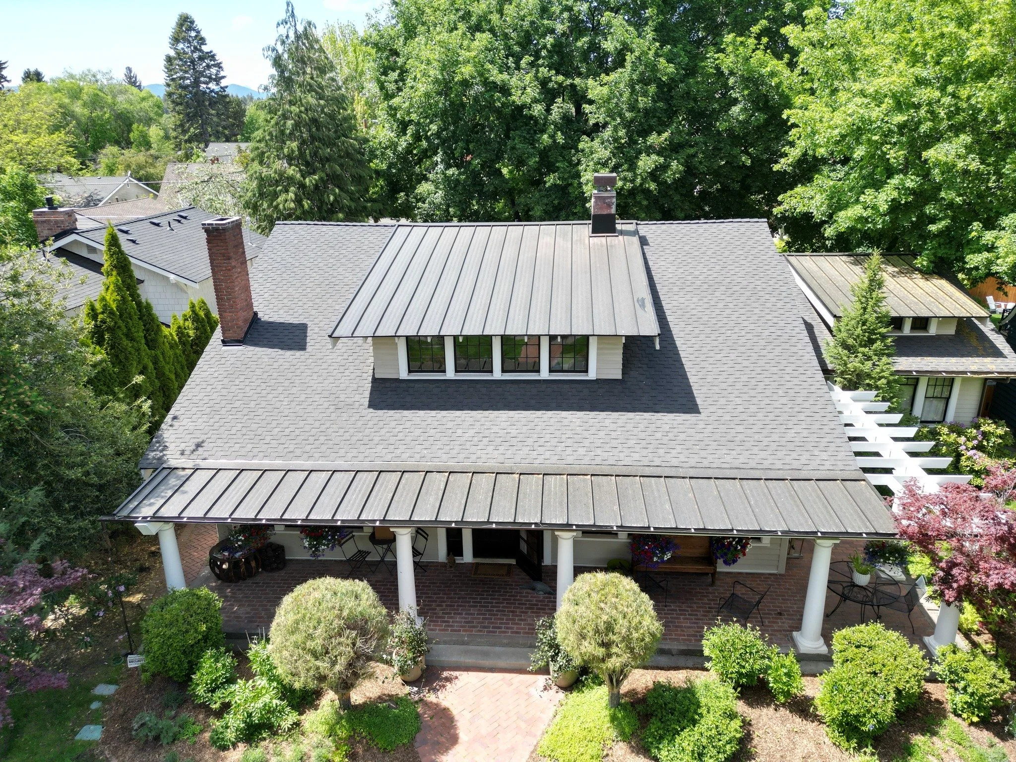 There's a saying that goes "you can't have it all." But in roofing, that's not true! Here's a great example of how shingle and metal roofs can be combined for a stunning combination! 

For a limited time you can save 5% on your roof replace