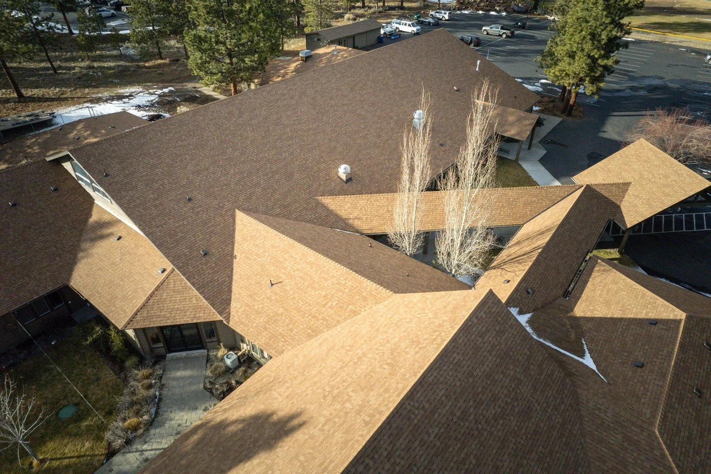 Roof geometry influences how a system performs over time. If you&rsquo;re conducting a ground-up build or making big changes to your current structure, thoughtful planning helps ensure water sheds properly and materials function as intended.