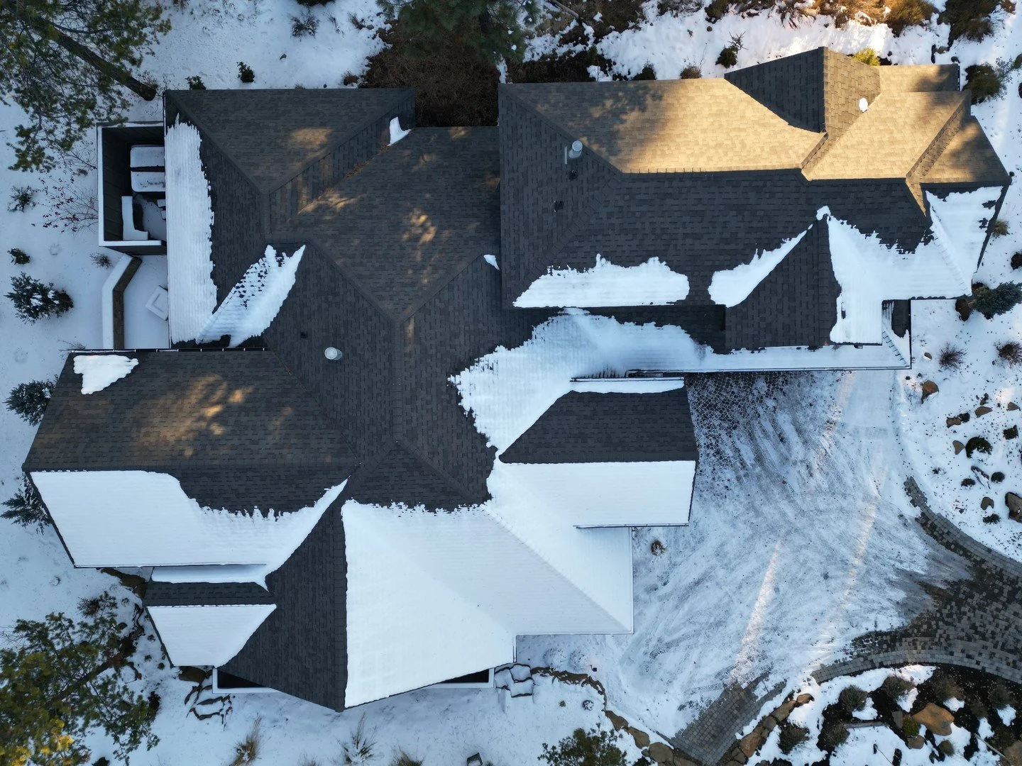 Roofs in Central Oregon must be designed for winter conditions. Snow management, drainage, and ventilation all play an important role in protecting a home year-round.