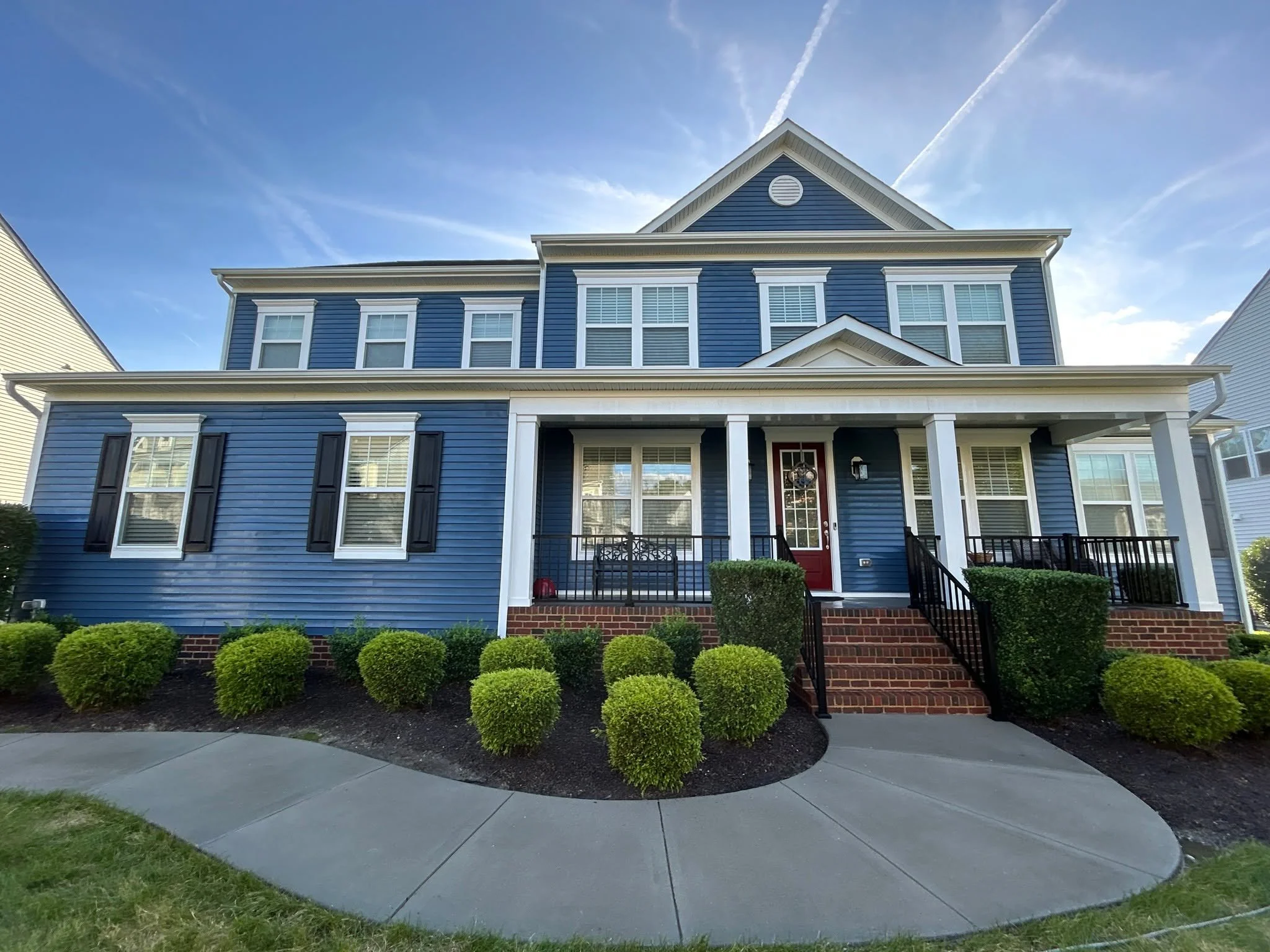 When the lighting cooperates and the clean speaks for itself.

Front, side, and back&mdash;this home received a full professional power wash, refreshing every surface and bringing out a bright, consistent clean from every angle. The sun and clouds co