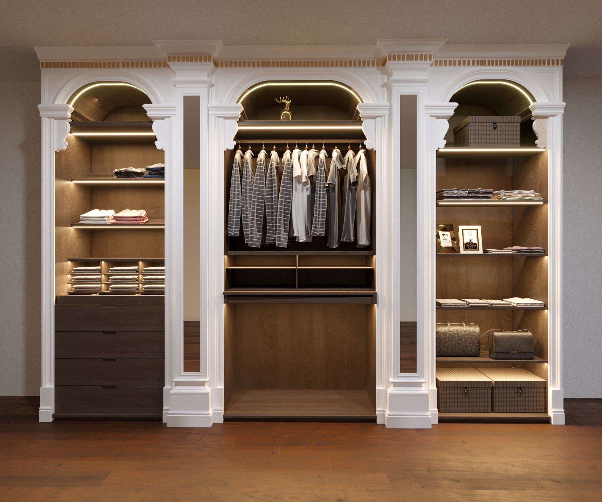 Organized walk-in closet with shirts hung, folded clothes, drawers, and storage boxes