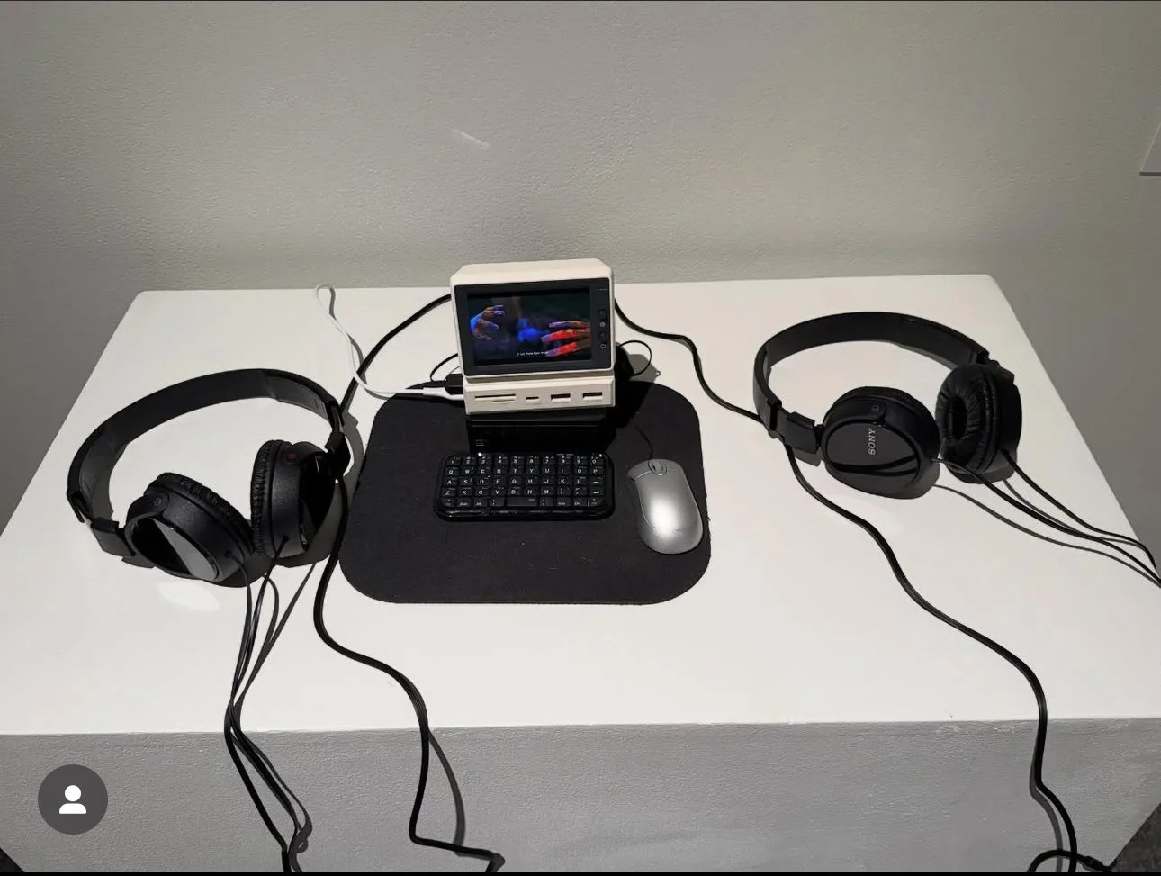 "Greysia's Desk," a functional 3.5" computer programmed to loop "Deep Down", "The Woes", and "Let It Go."