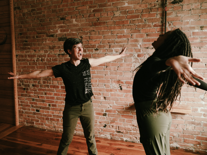 two people stretching and yelling