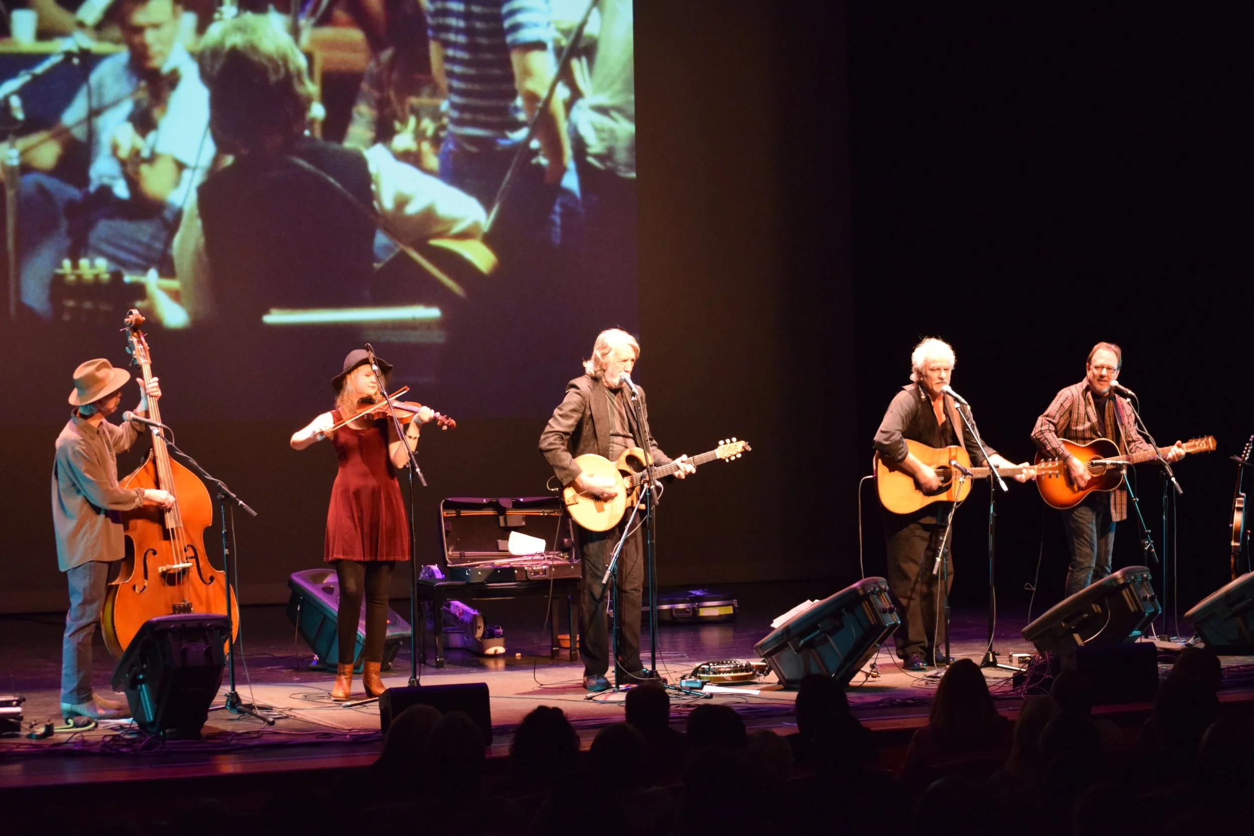 A band plays on stage.