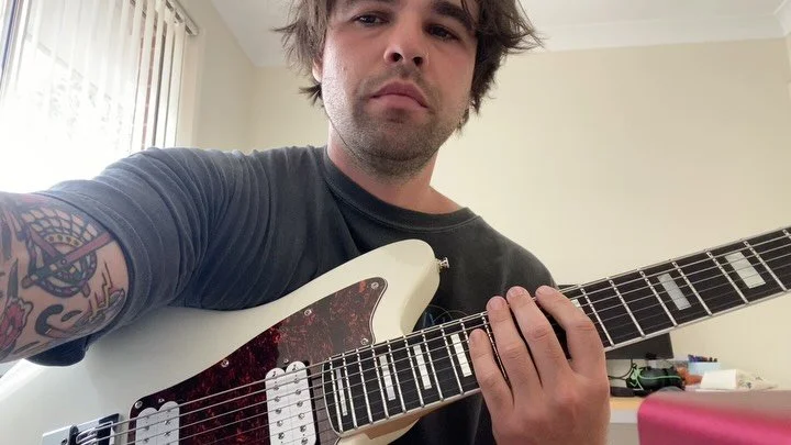 Writing the dumbest riffs that are gonna be impossible to sing and play at the same time 

Swipe to see the end result and some pure talent (I am terrible at guitar)