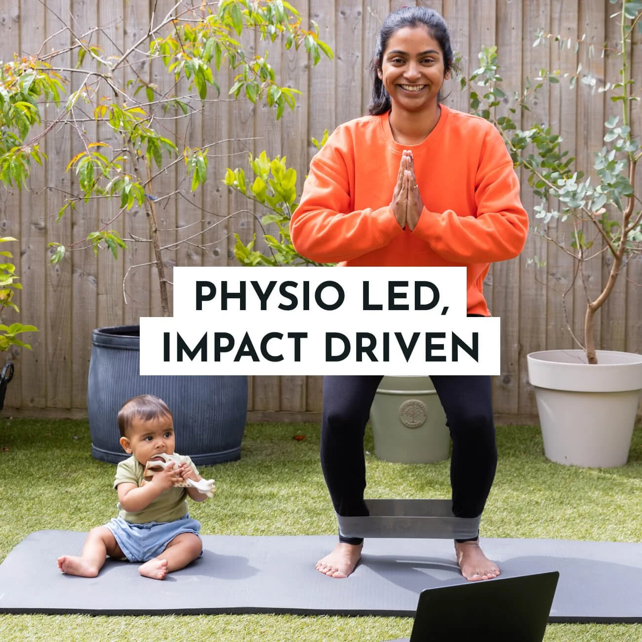 Lady smiling whilst working out outdoors