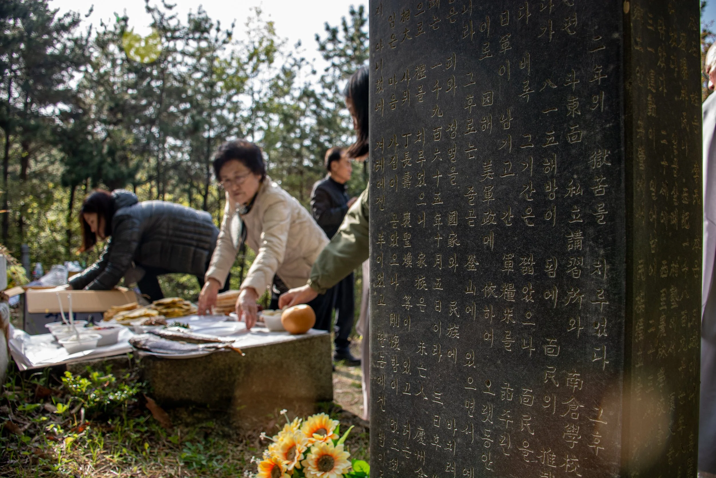 The Lee family prepares for the blessing prayers ceremony in honor of Lee Jong-wook in Busan.