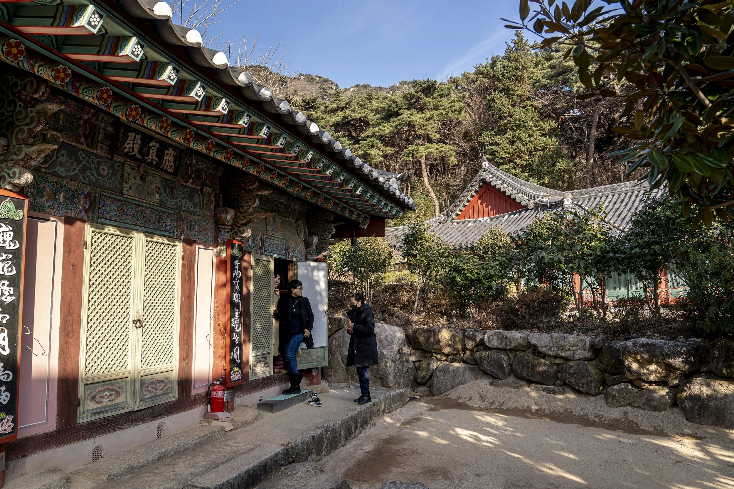 Visitors pray at Eunhasa Temple in Sineosan Mountain in Gimhae.