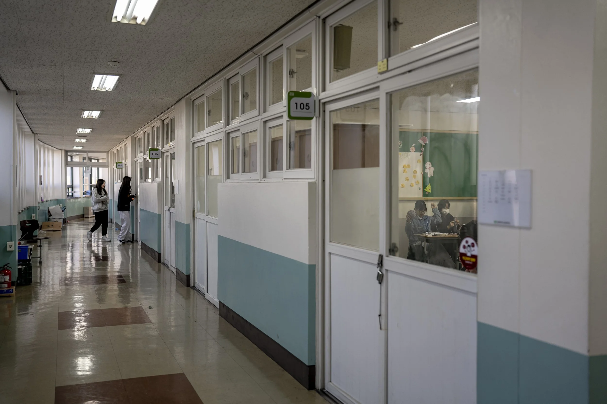 Students walk through the corridors at Gimhae Girls’ High School.