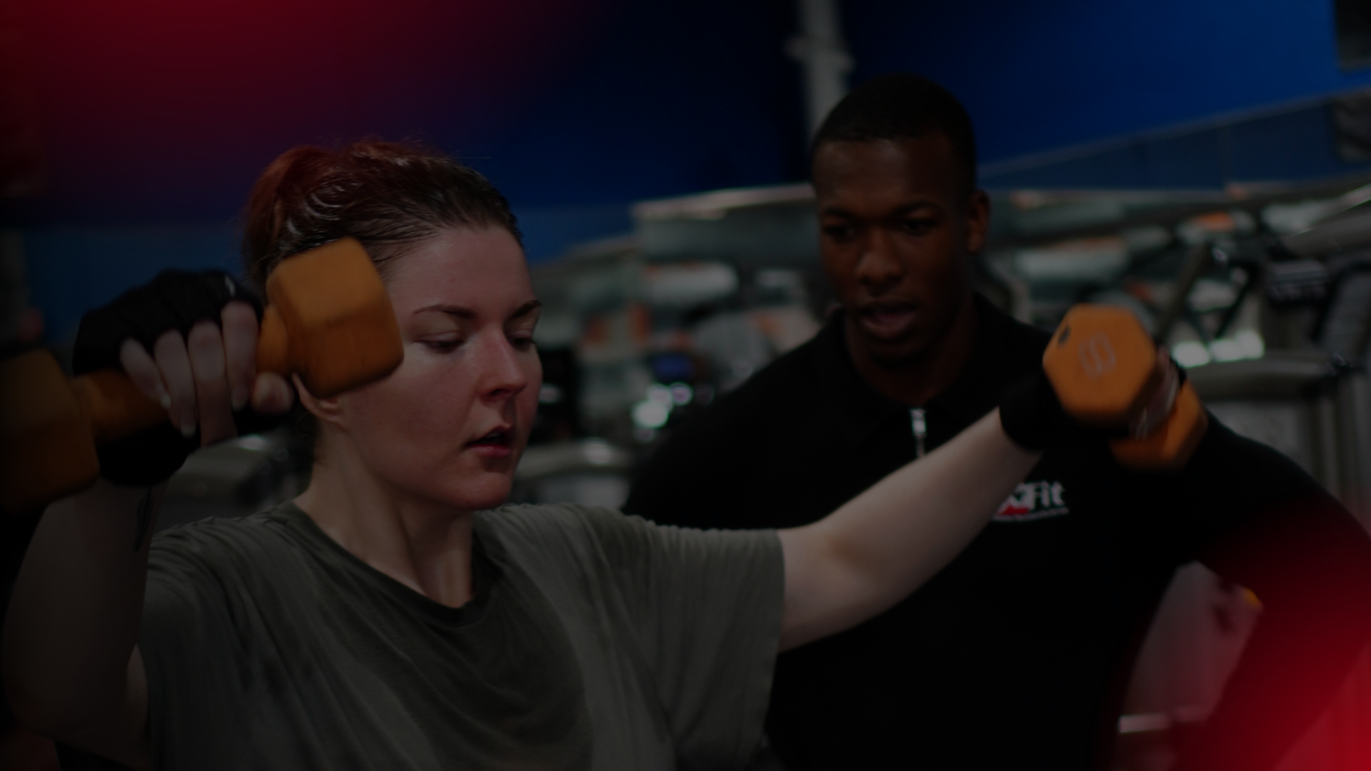 Client doing free weights at SoFit Orlando