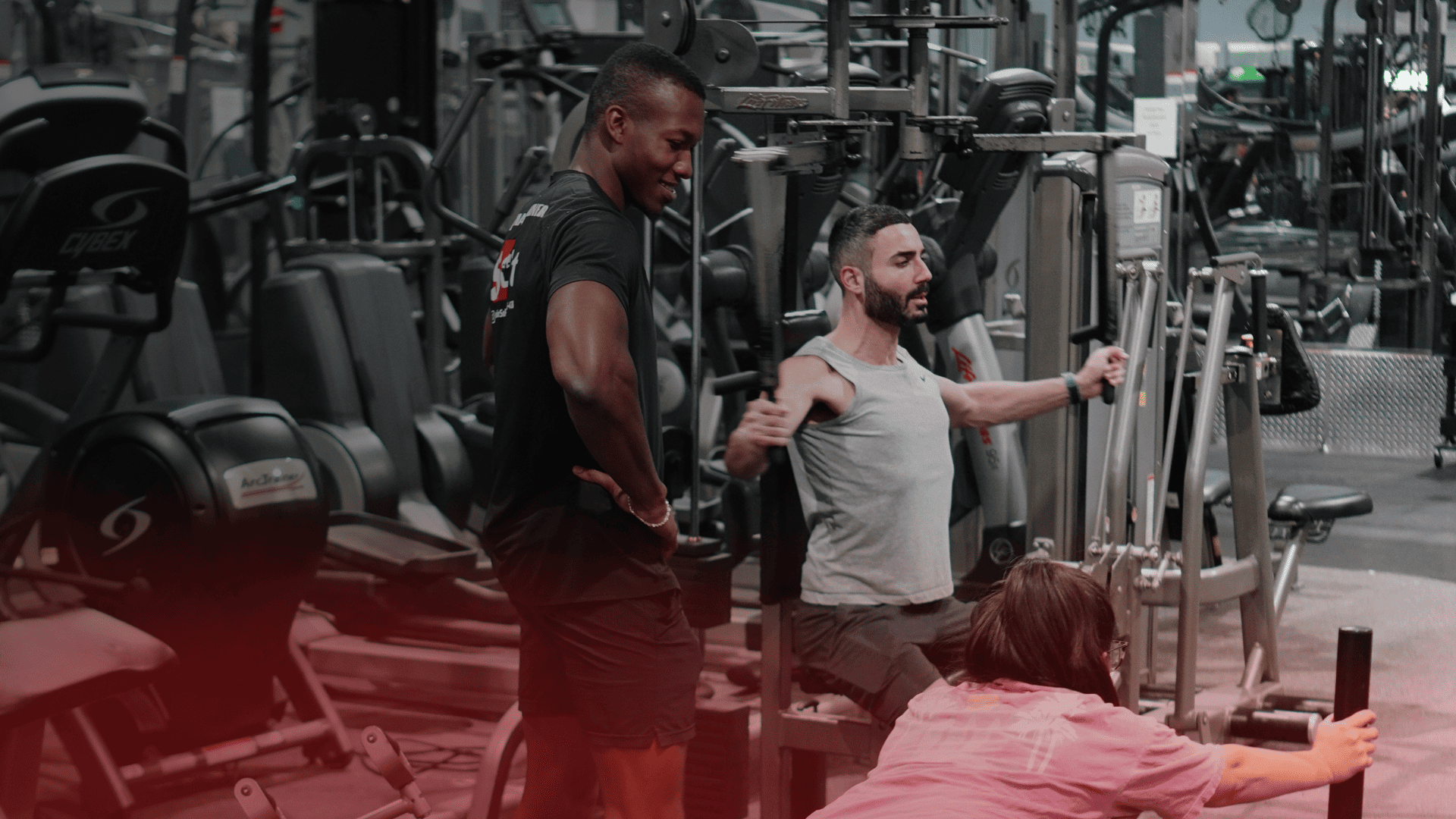 Personal trainer in Orlando coaching a client during a structured workout session at SoFit gym