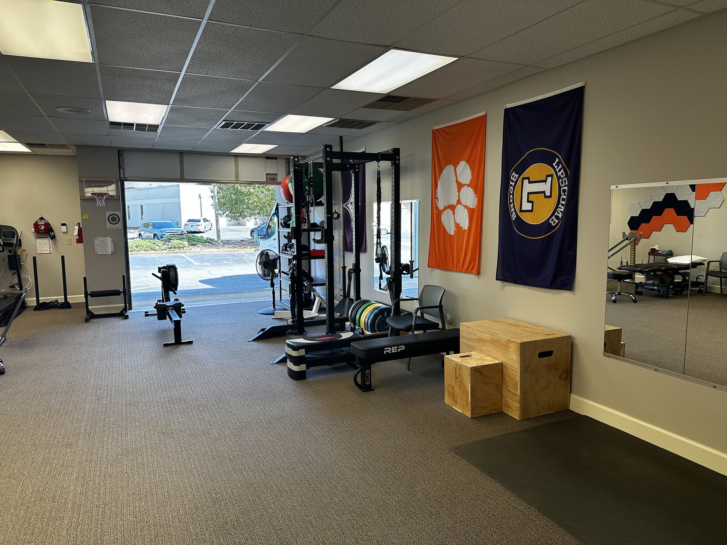 Clean gym with weights for physical therapy in Greenville, SC