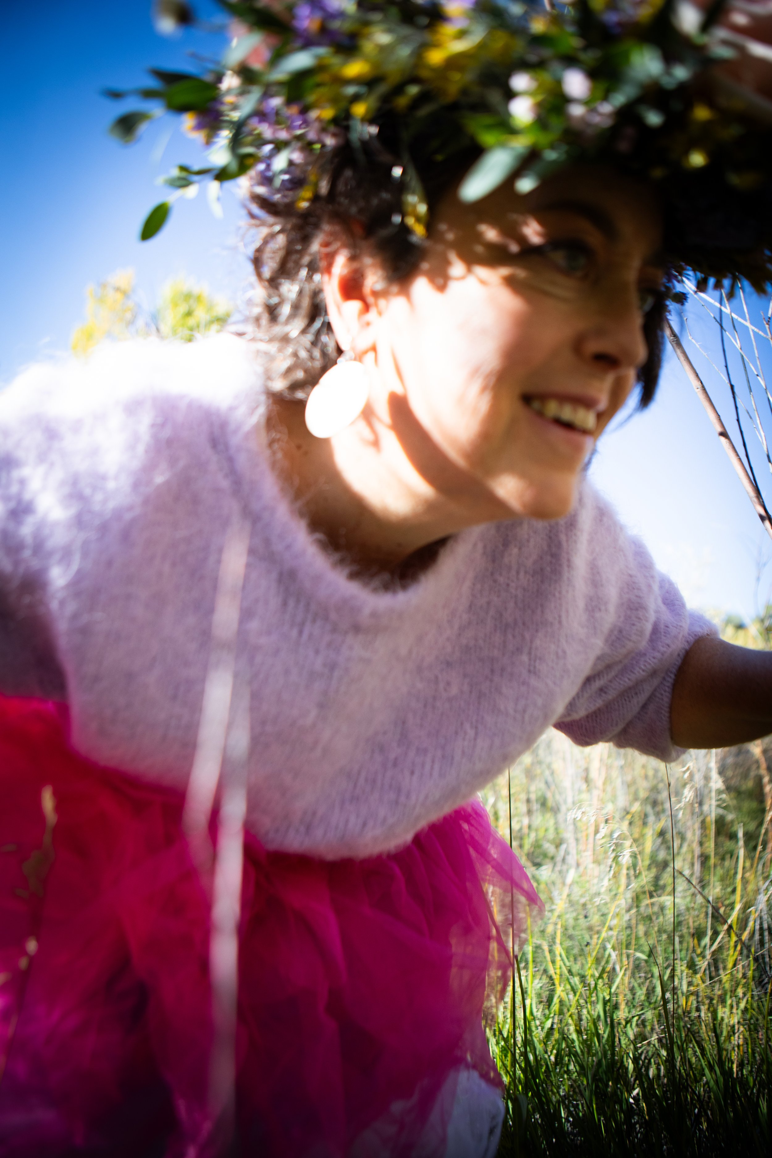 close up face, walking in tall grass, flower crown