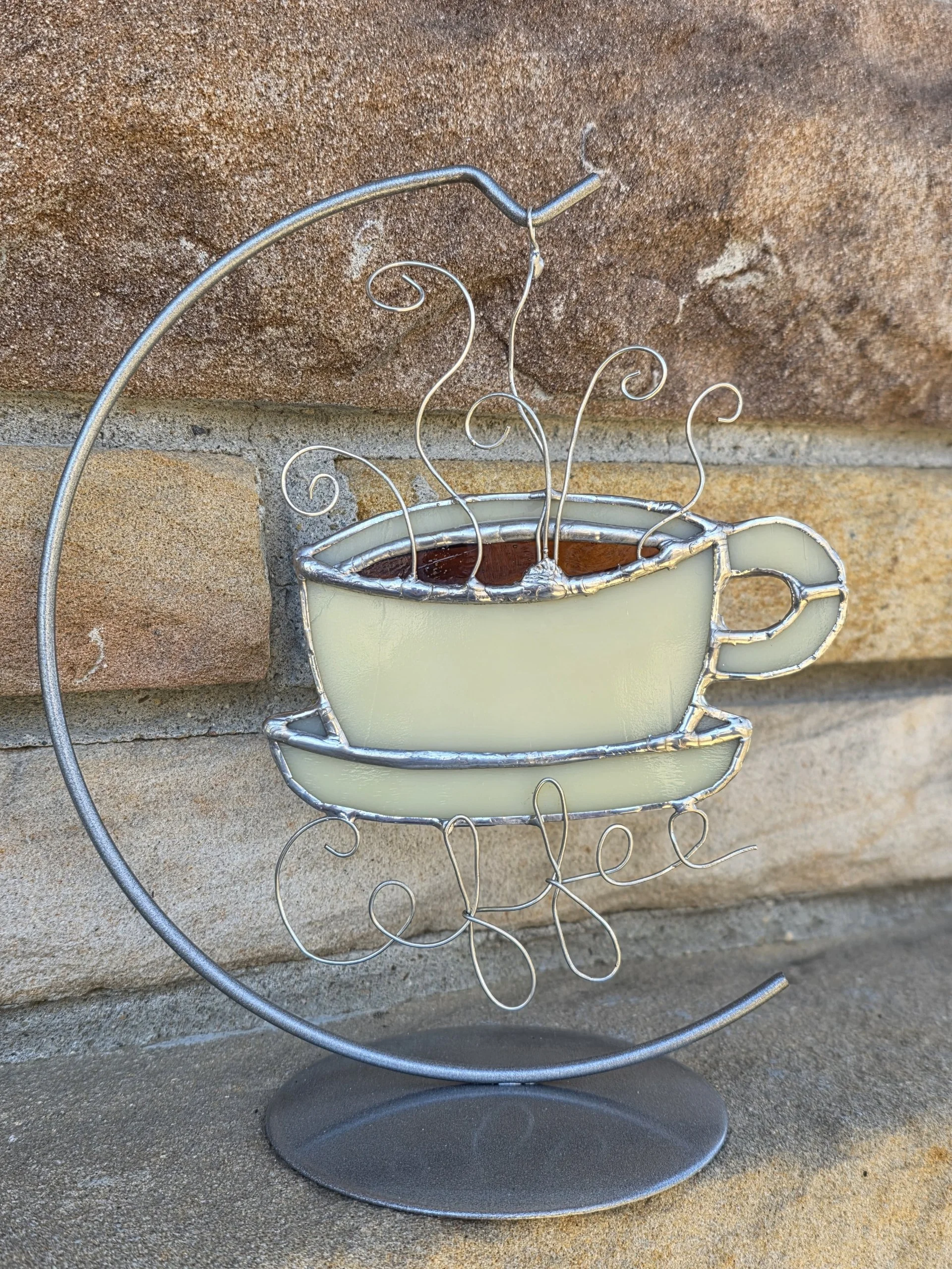 Stained glass coffee cup window piece.